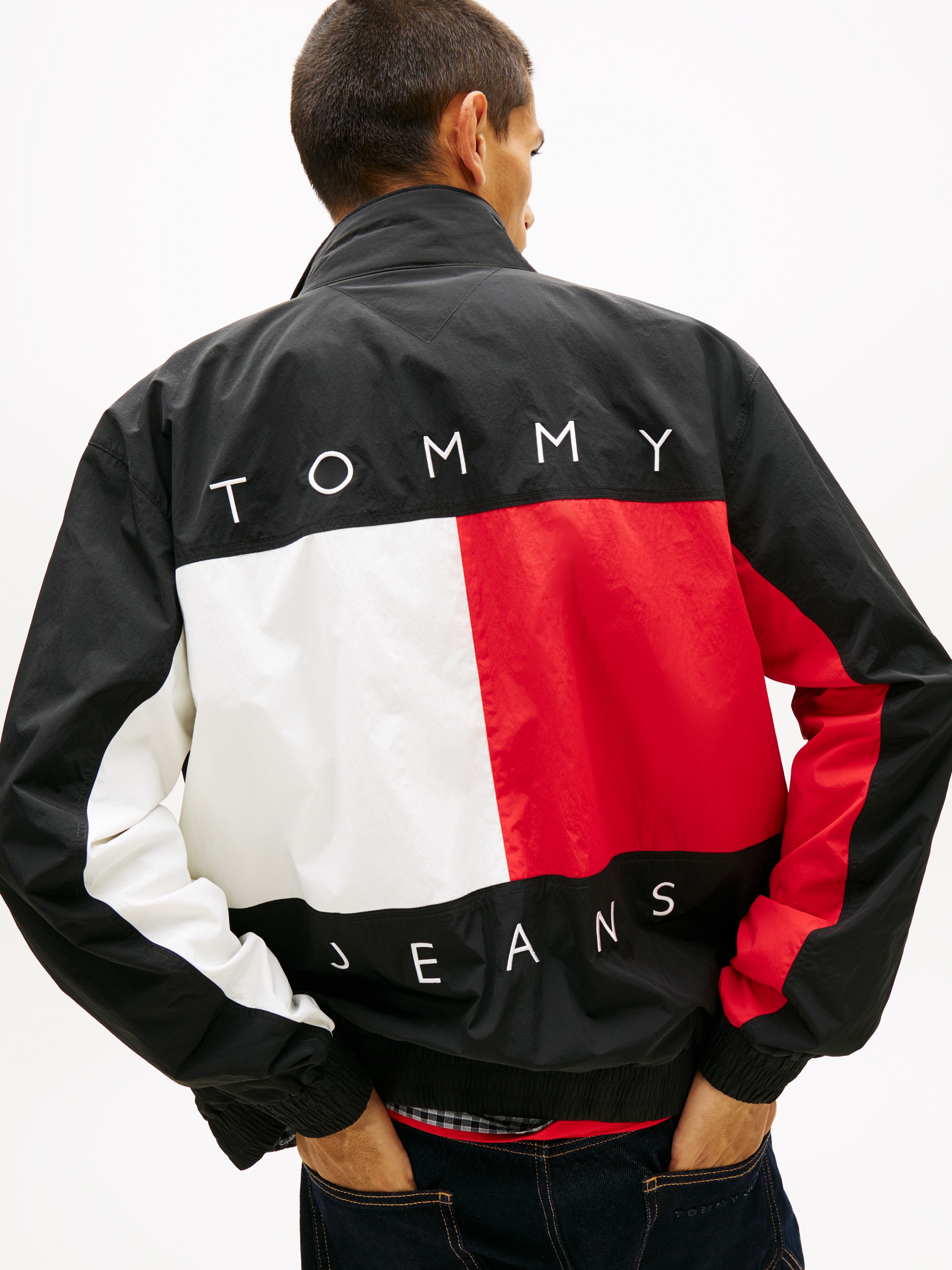 Image of Tommy Jeans Windbreaker "TJM HERITAGE FLAG" ohne Kapuze Regular fit mit Stehkragen und Markenprint Rückenprint Tommy Flag