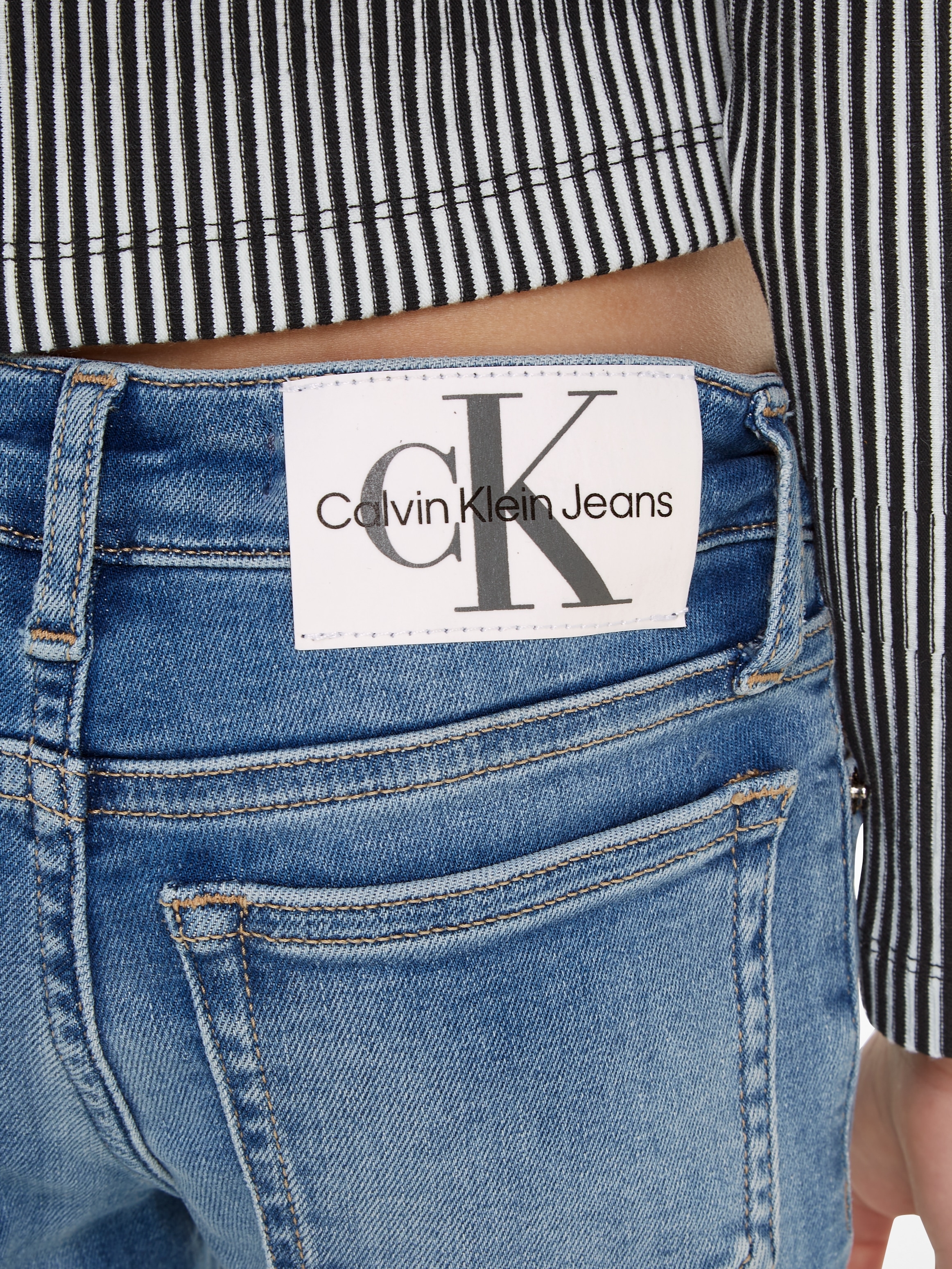 ♕ Calvin Klein Jeans Stretch-Jeans »FLARE MR SPLIT VISUAL MID BLUE«  versandkostenfrei auf