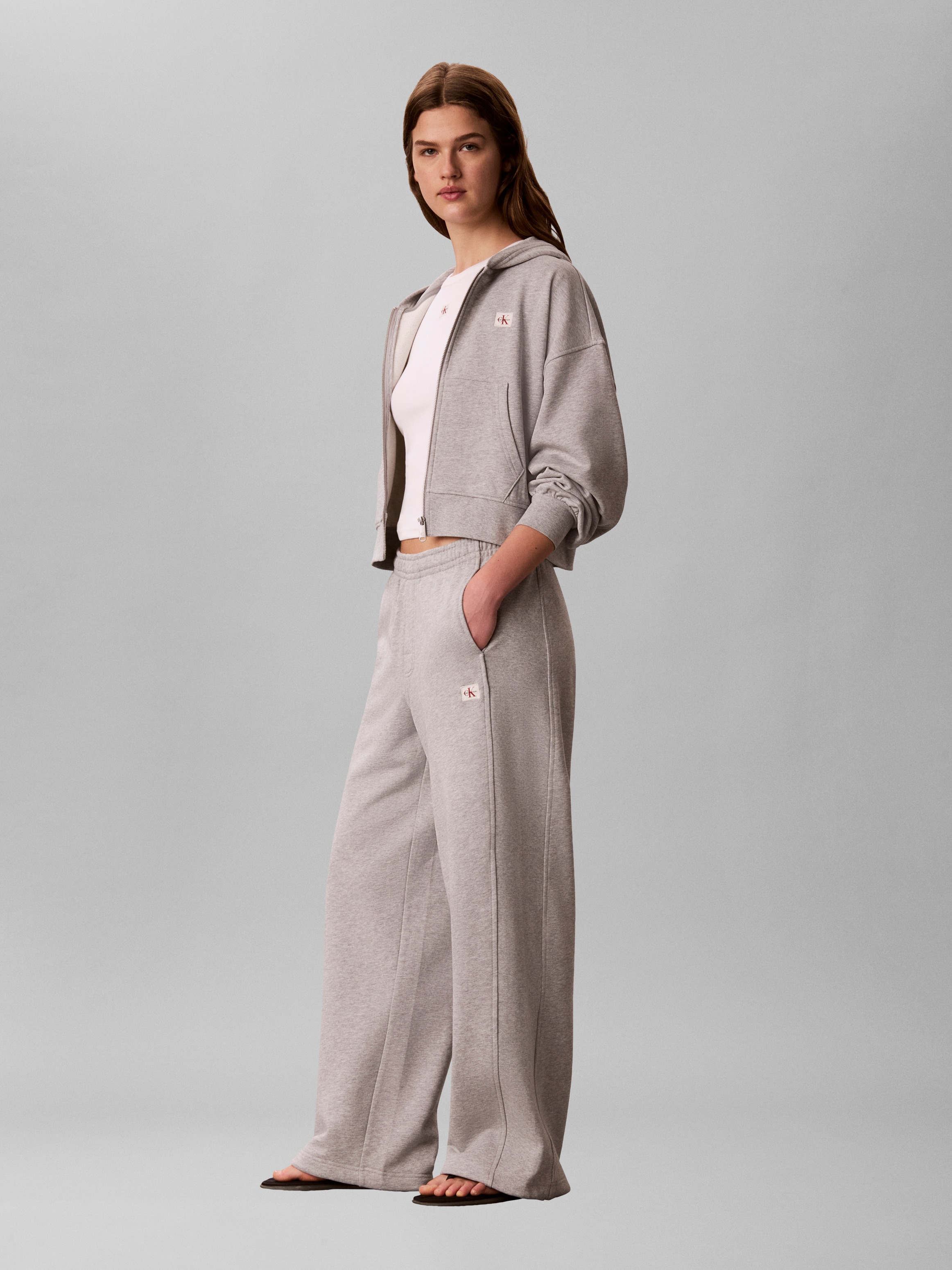 Calvin Klein Jeans Pantalon sweat »A- FRENCH TERRY BADGE LOGO PANT«  mit weitem Bein