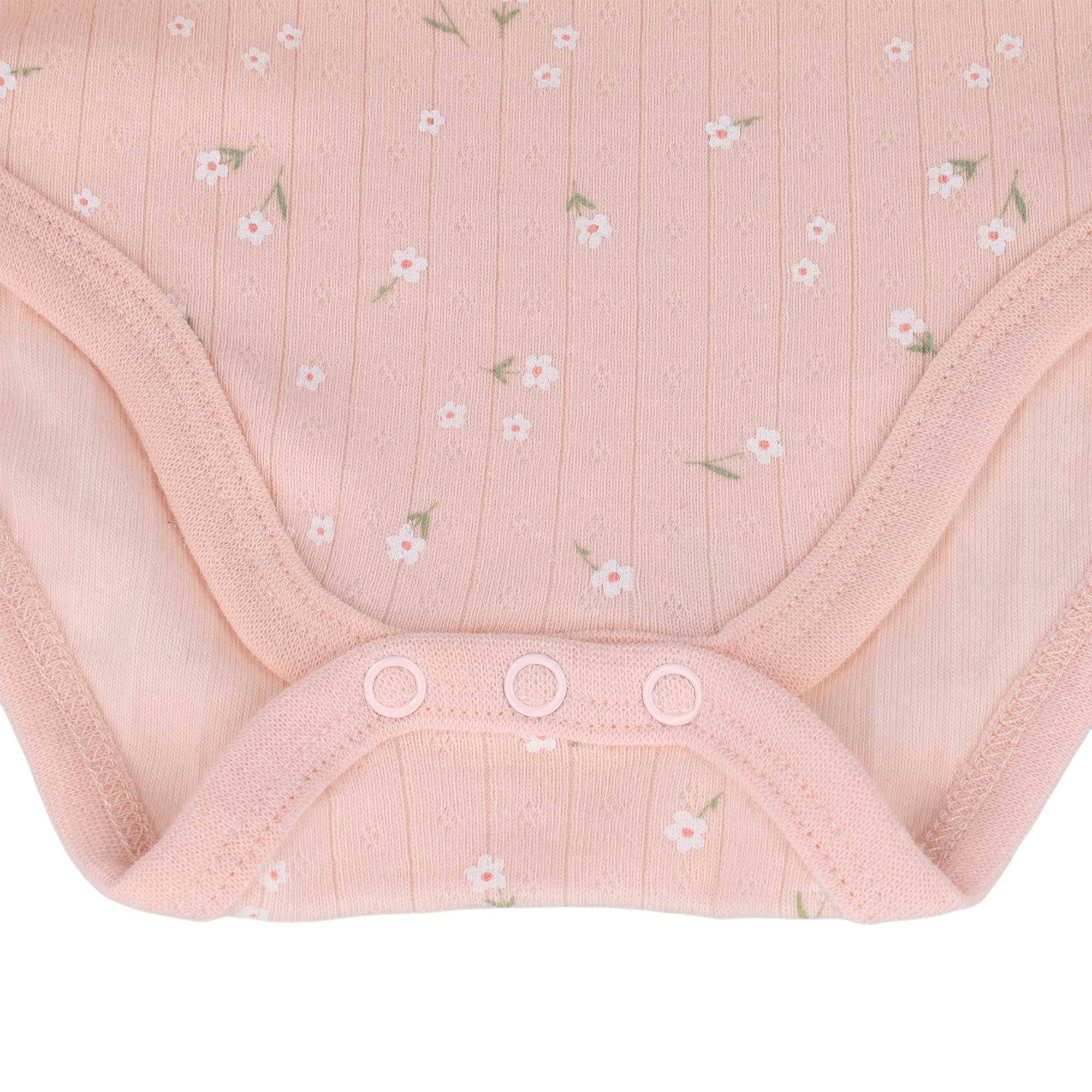 MAXIMO Body à manches courtes 1 rose pâle, imprimé floral intégral, manches courtes, bébé fille