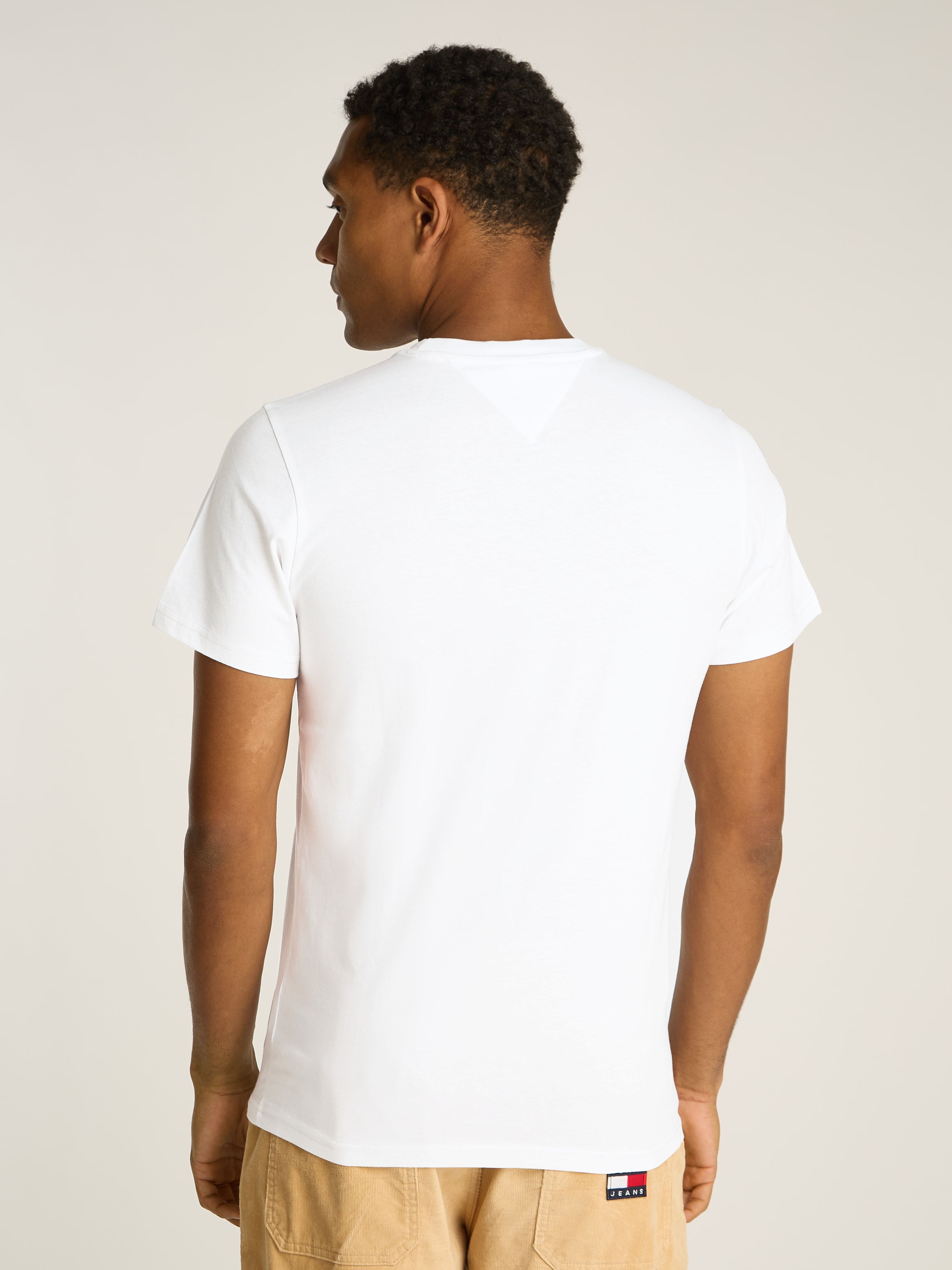 Tommy Jeans T-Shirt »TJM SLIM LINEAR CHEST TEE EXT«, mit Logoschriftzug