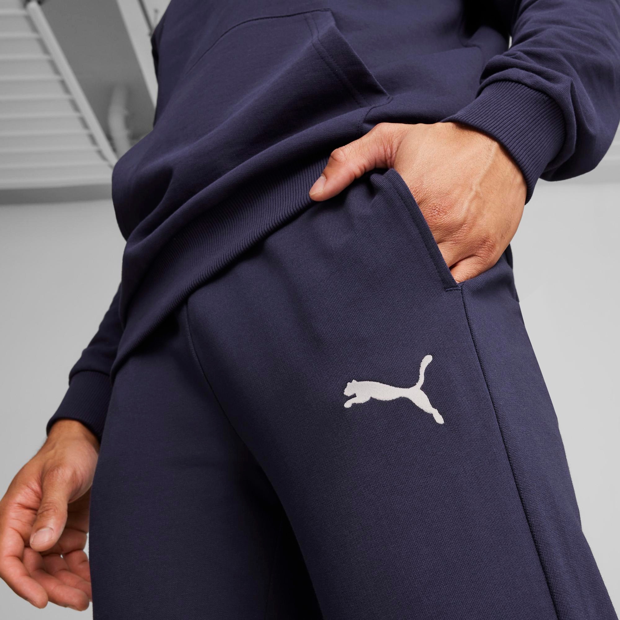 PUMA Pantalon de survêtement »TEAMGOAL CASUALS PANTS«  coupe slim fit, pour football et activités sportives