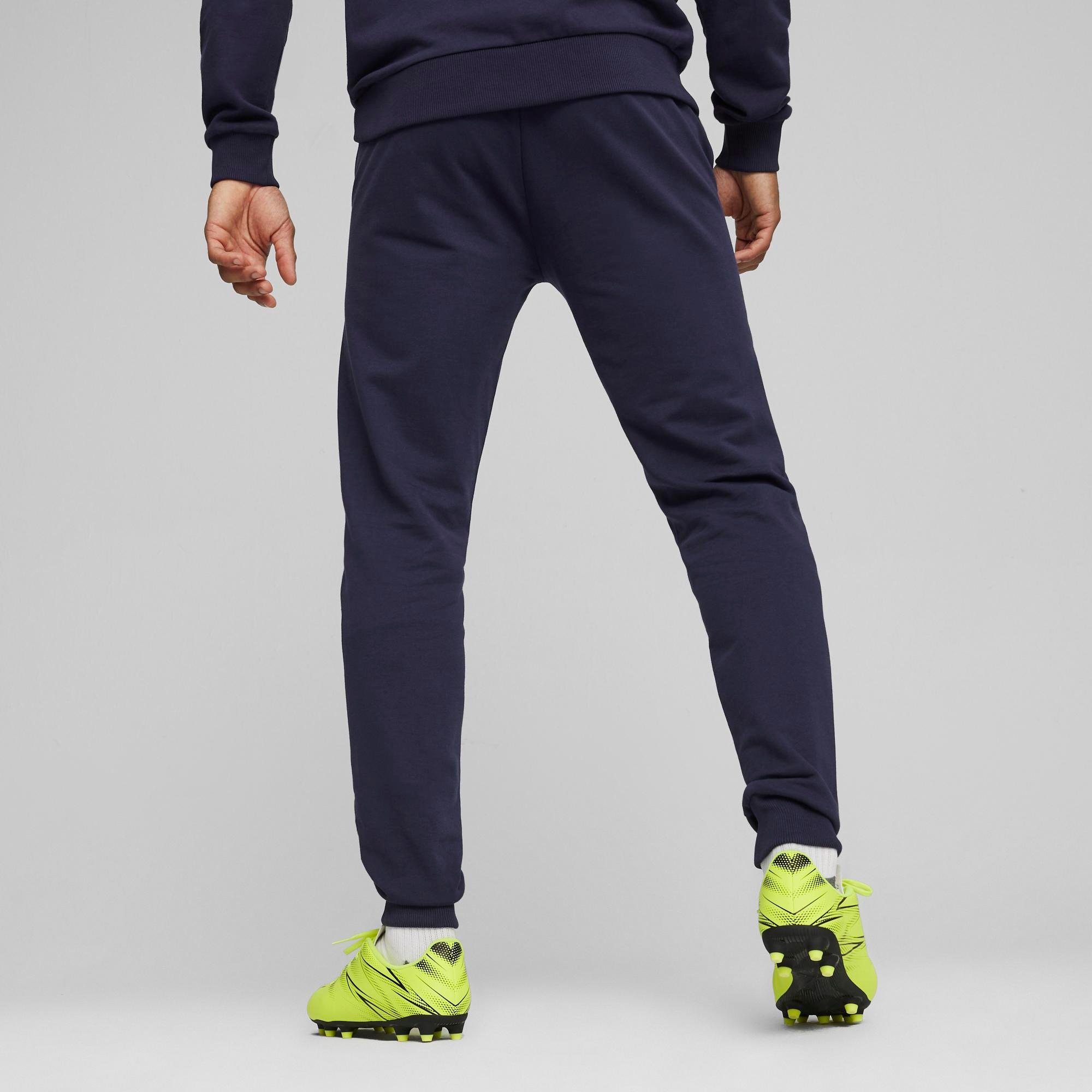 PUMA Pantalon de survêtement »TEAMGOAL CASUALS PANTS«  coupe slim fit, pour football et activités sportives