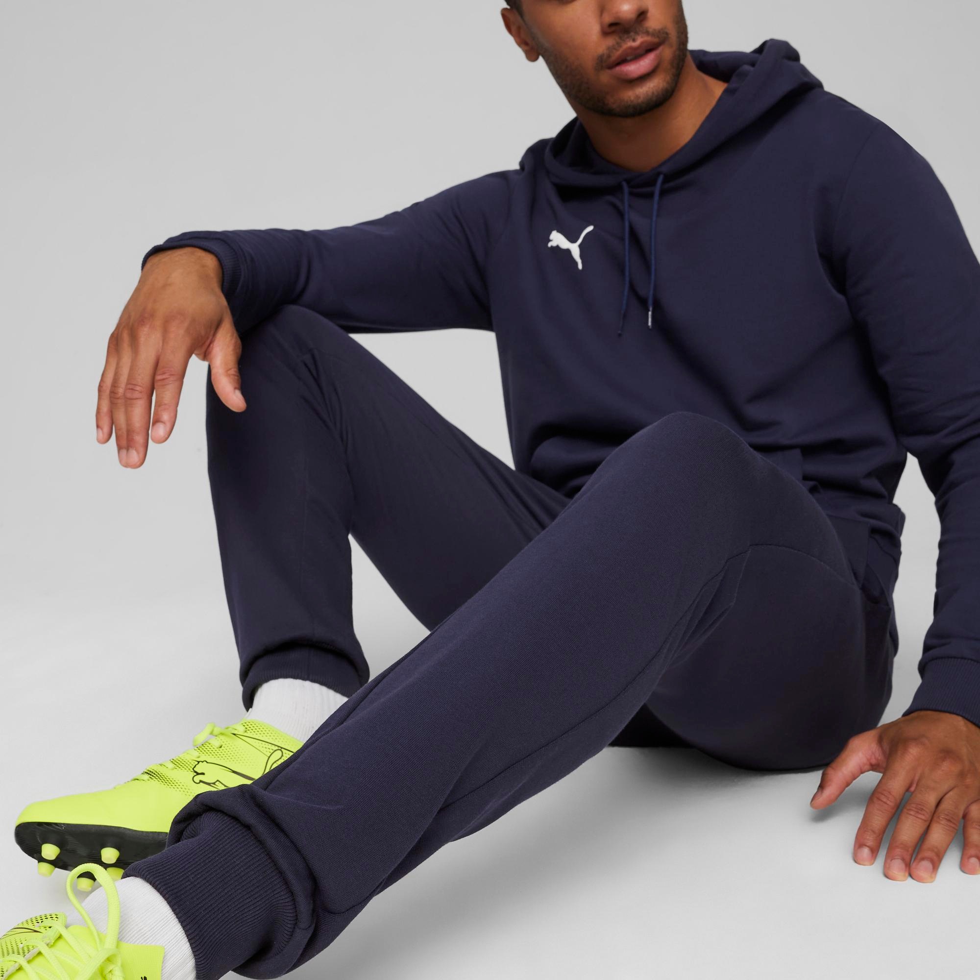 PUMA Pantalon de survêtement »TEAMGOAL CASUALS PANTS«  coupe slim fit, pour football et activités sportives