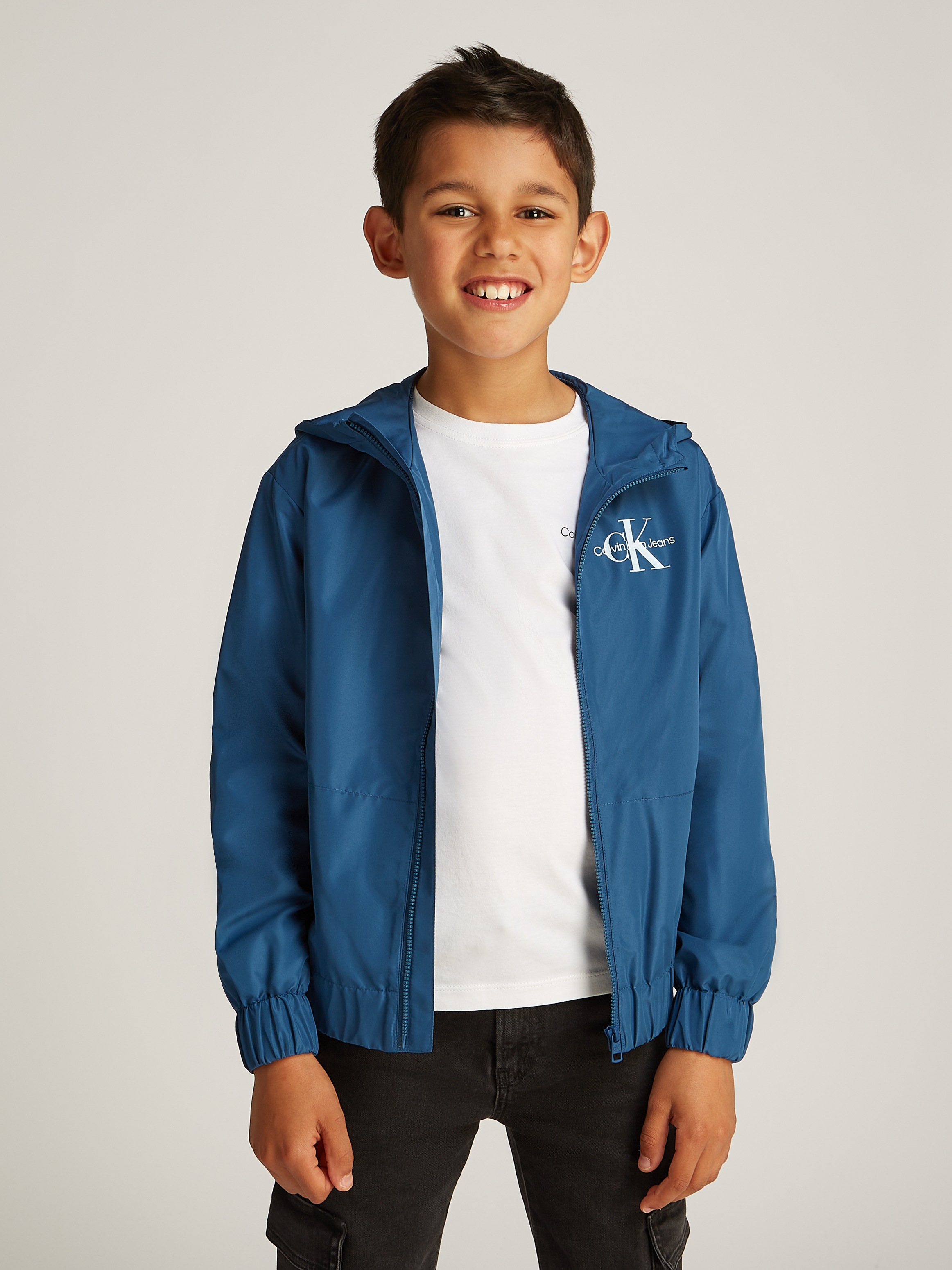 Calvin Klein Jeans Windbreaker »MONOLOGO ESSENTIAL JACKET« mit Kapuze für Kinder bis 16 Jahre mit Logo-Print