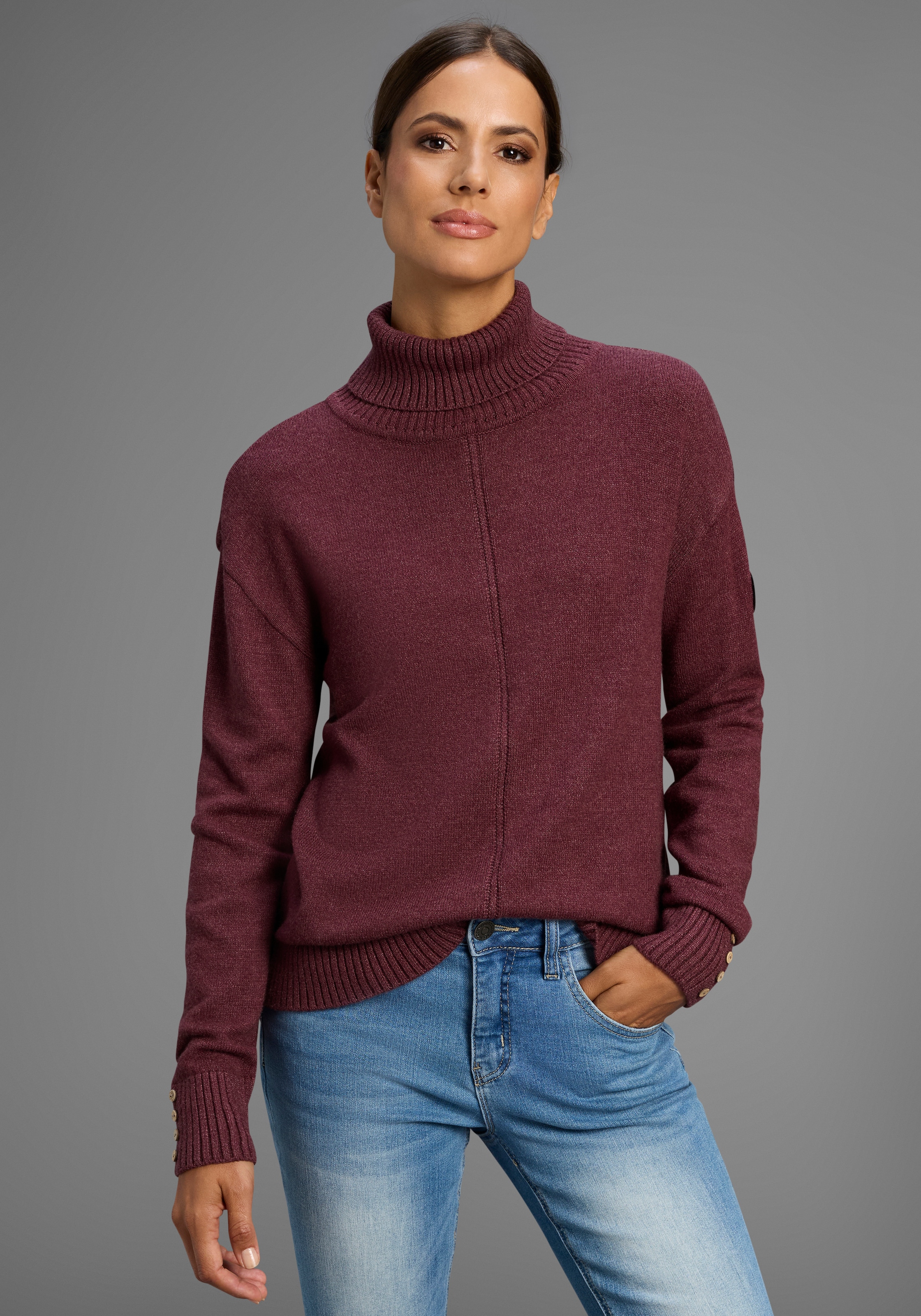 Image of KangaROOS Rollkragenpullover mit Knopfdetail am Saum