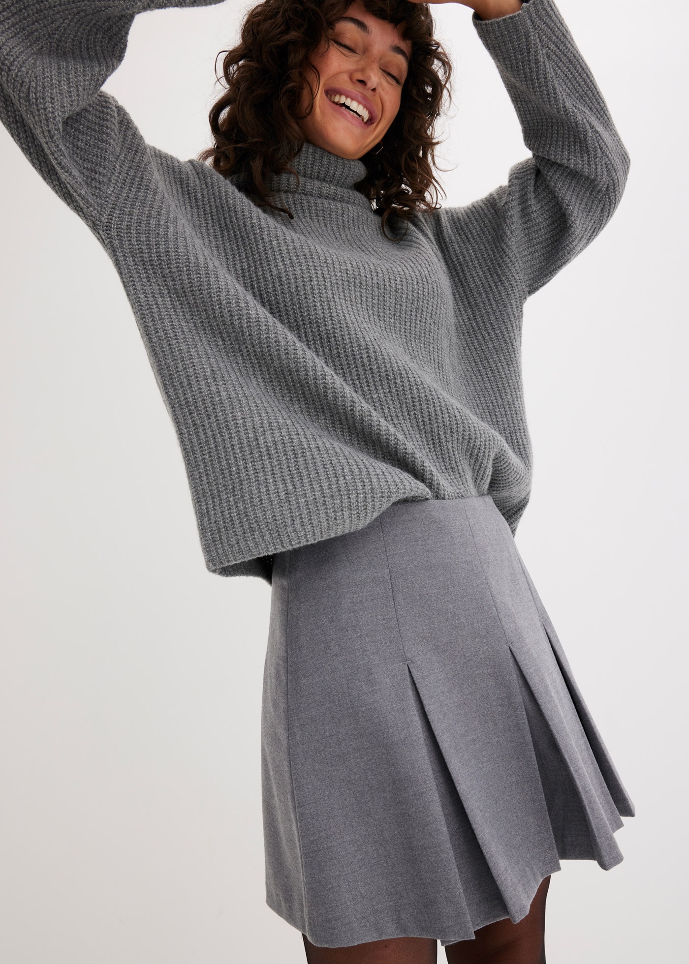 bonprix Minijupe aus Viskose-Mix, figurbetonte Passform, Faltenrock-Design