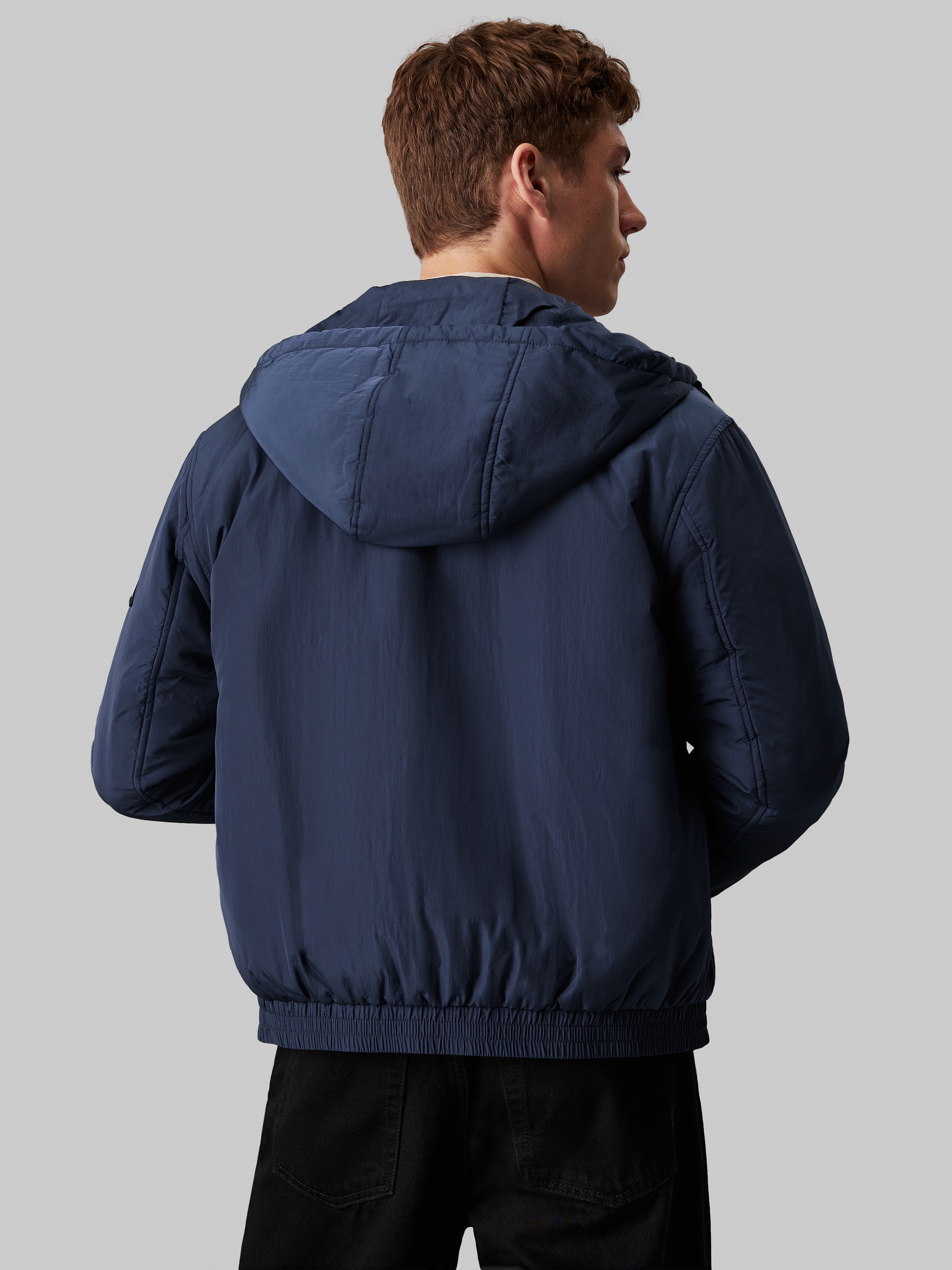 Calvin Klein Jeans Outdoorjacke »PADDED HOODED HARRINGTON« mit Kapuze mit Logoprägung