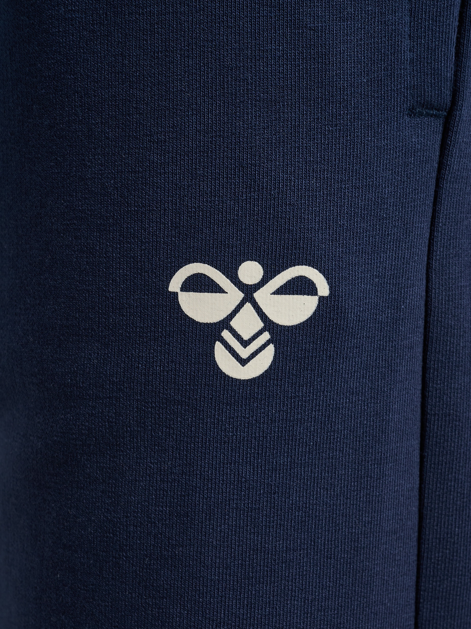 hummel Sweathose »HMlJR REG TUKAS PANTS«  mit Seitentaschen, aus Baumwolle und Elasthan