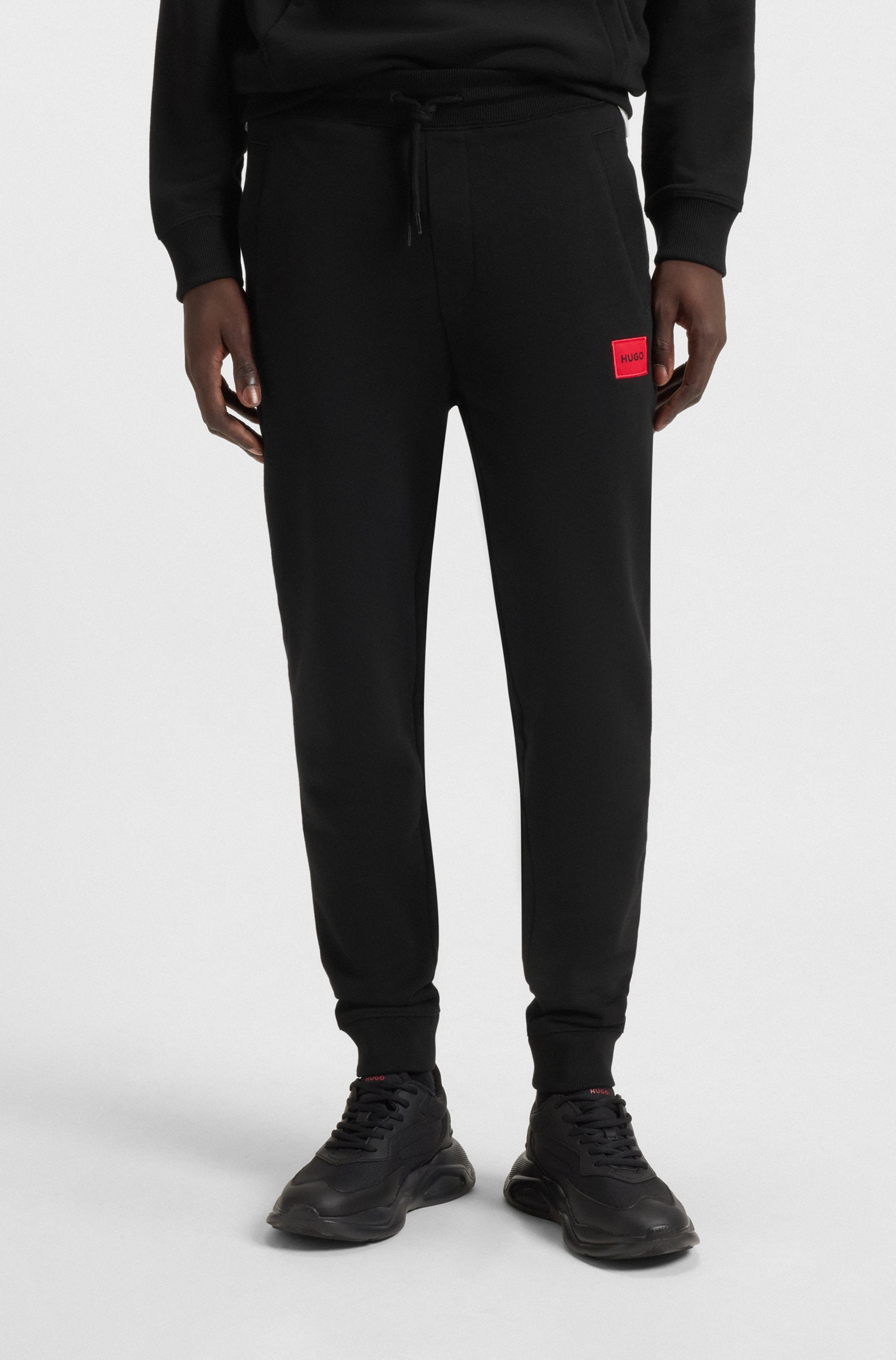 Image of HUGO Sweathose "Doak" elastischer Bund, Regular Fit, Seitentaschen, Gesässtasche