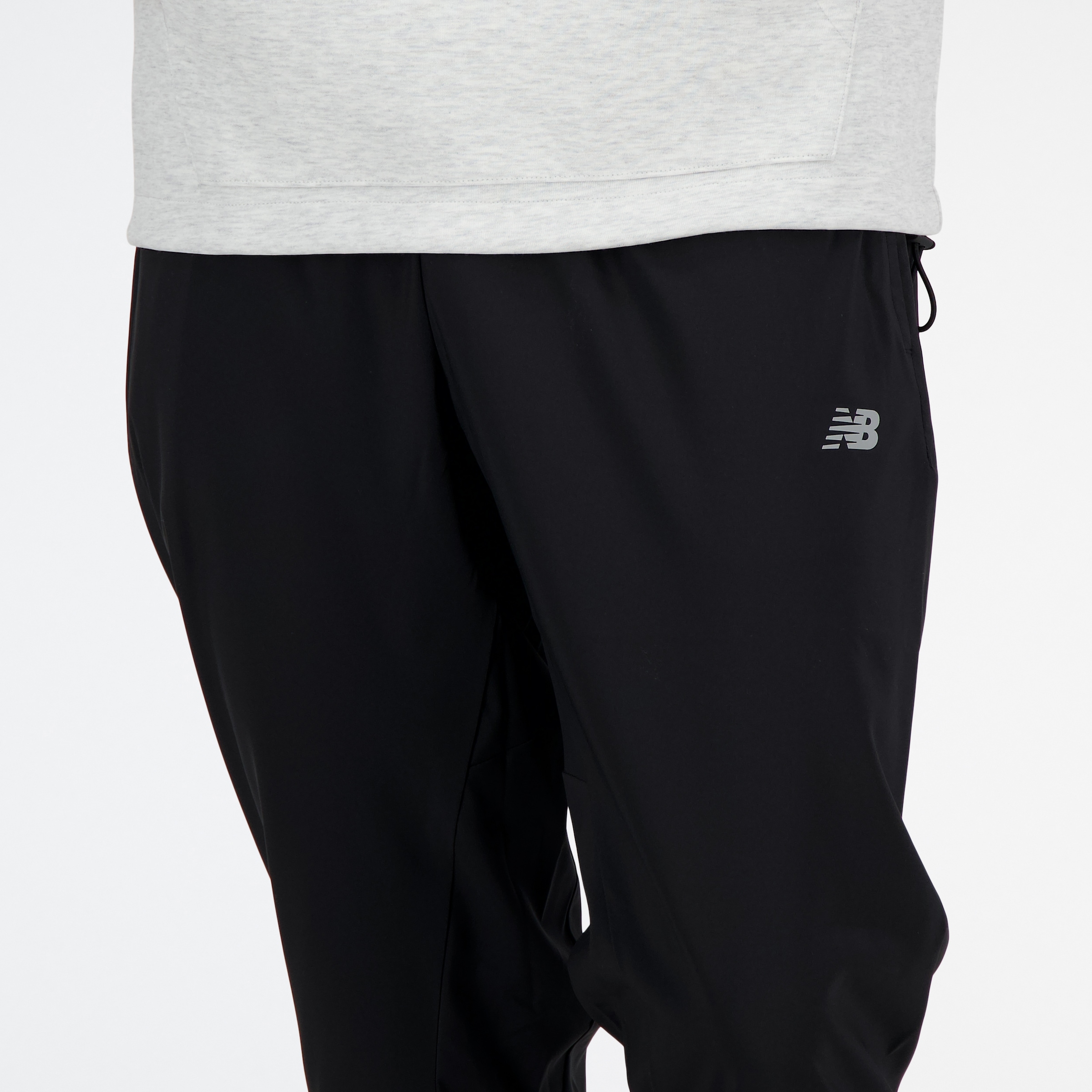 New Balance Trainingshose »SPORT ESSENTIALS WOVEN JOGGER«