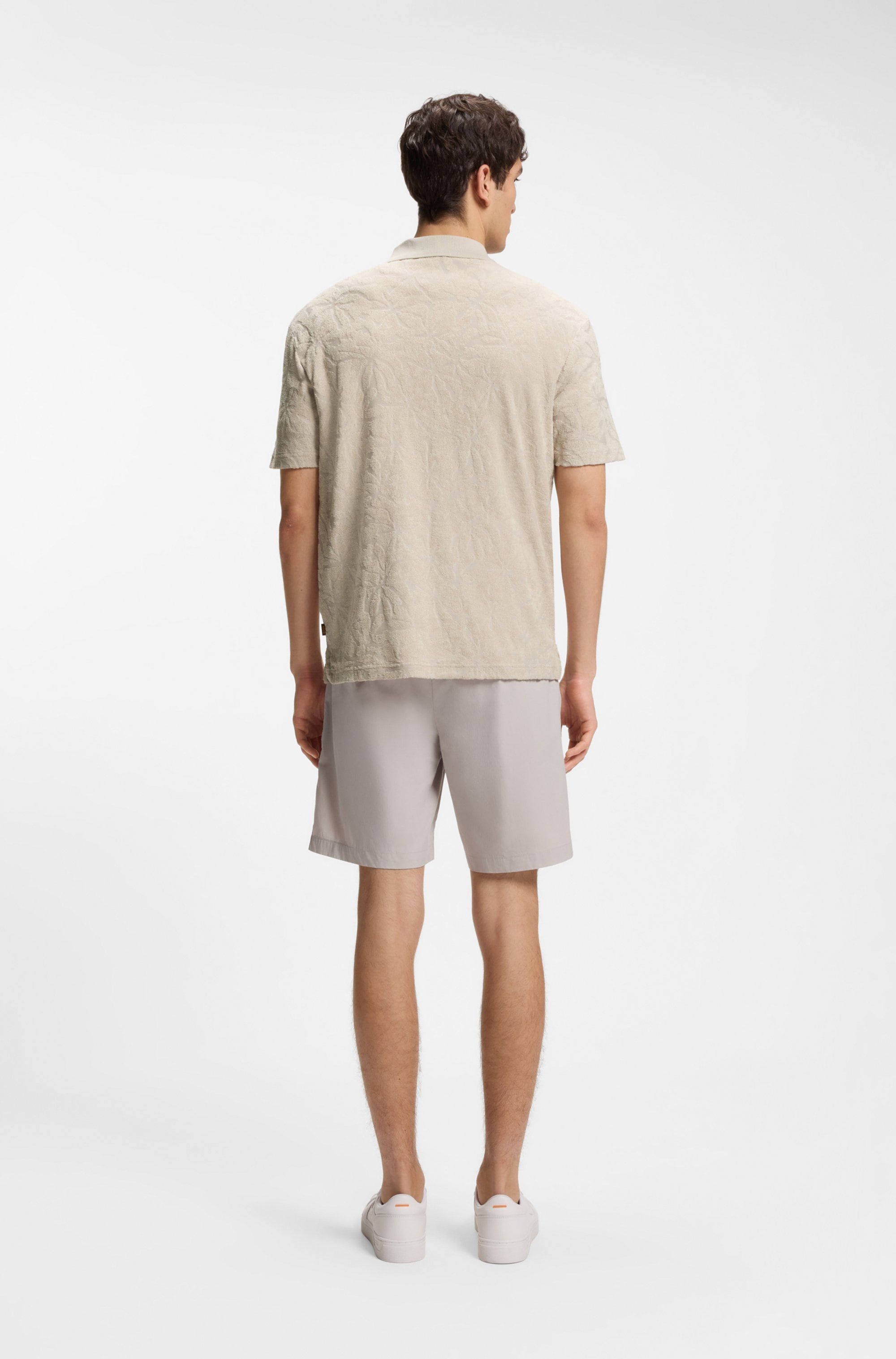 BOSS ORANGE Polo motif jacquard floral, éponge de coton, coupe décontractée