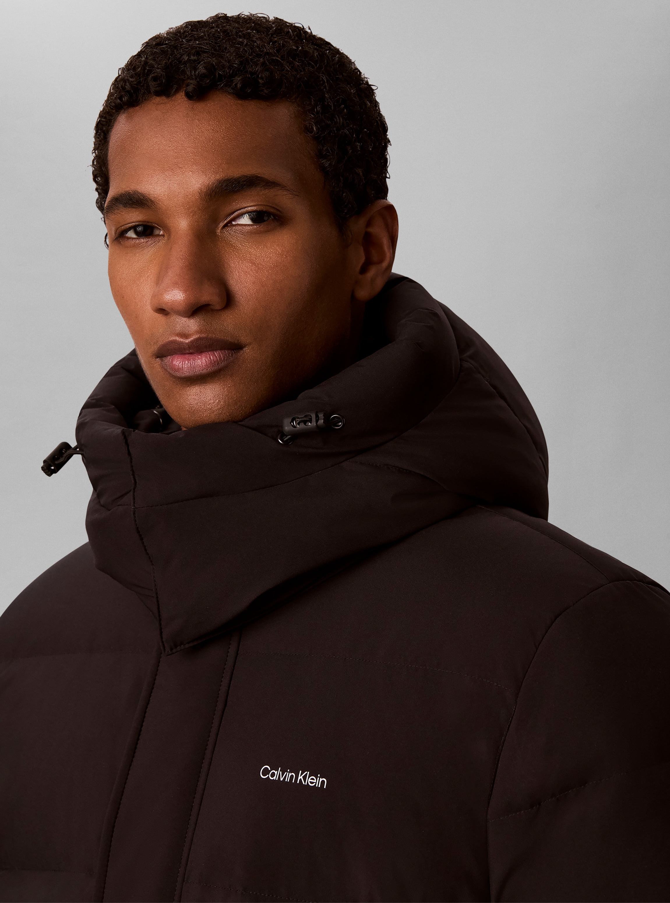 Calvin Klein Jeans Manteau matelassé »LS CLASSIC BONDED DOWN LONG« coupe régulière avec capuche