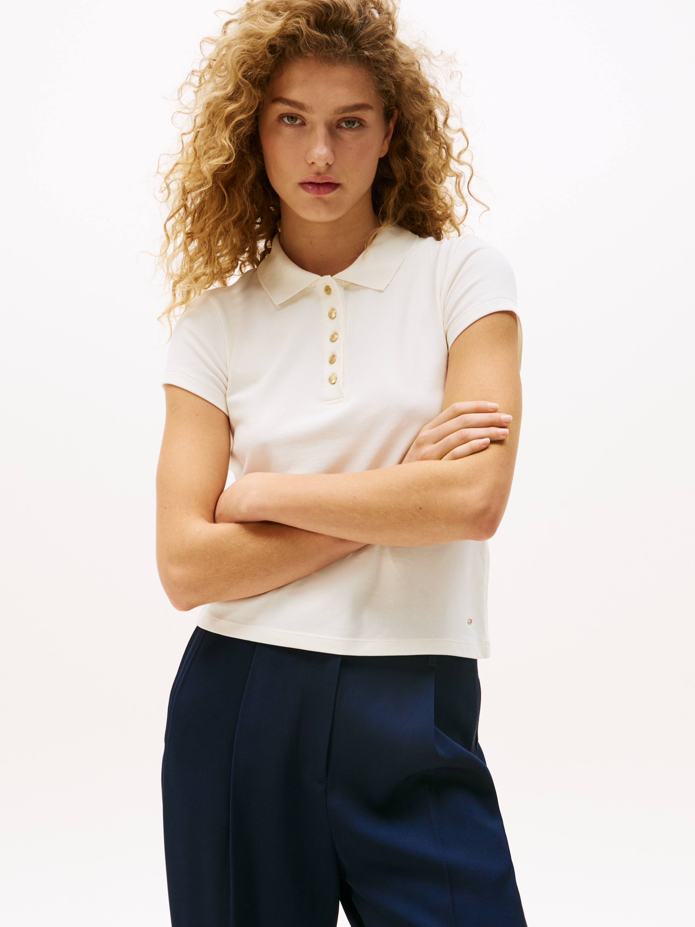 Image of Tommy Hilfiger Poloshirt "GOLD BUTTON SLIM SS POLO" mit goldfarbenen Knopf