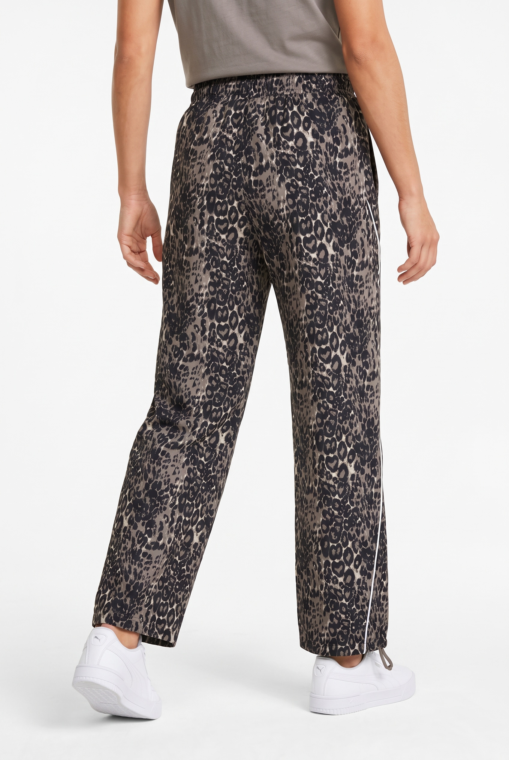 Image of PUMA Trainingshose "SPORT ANIMAL RELAXED AOP WIDE LEG WOVEN PANTS" mit Eingrifftaschen, normale Länge, aus Polyester