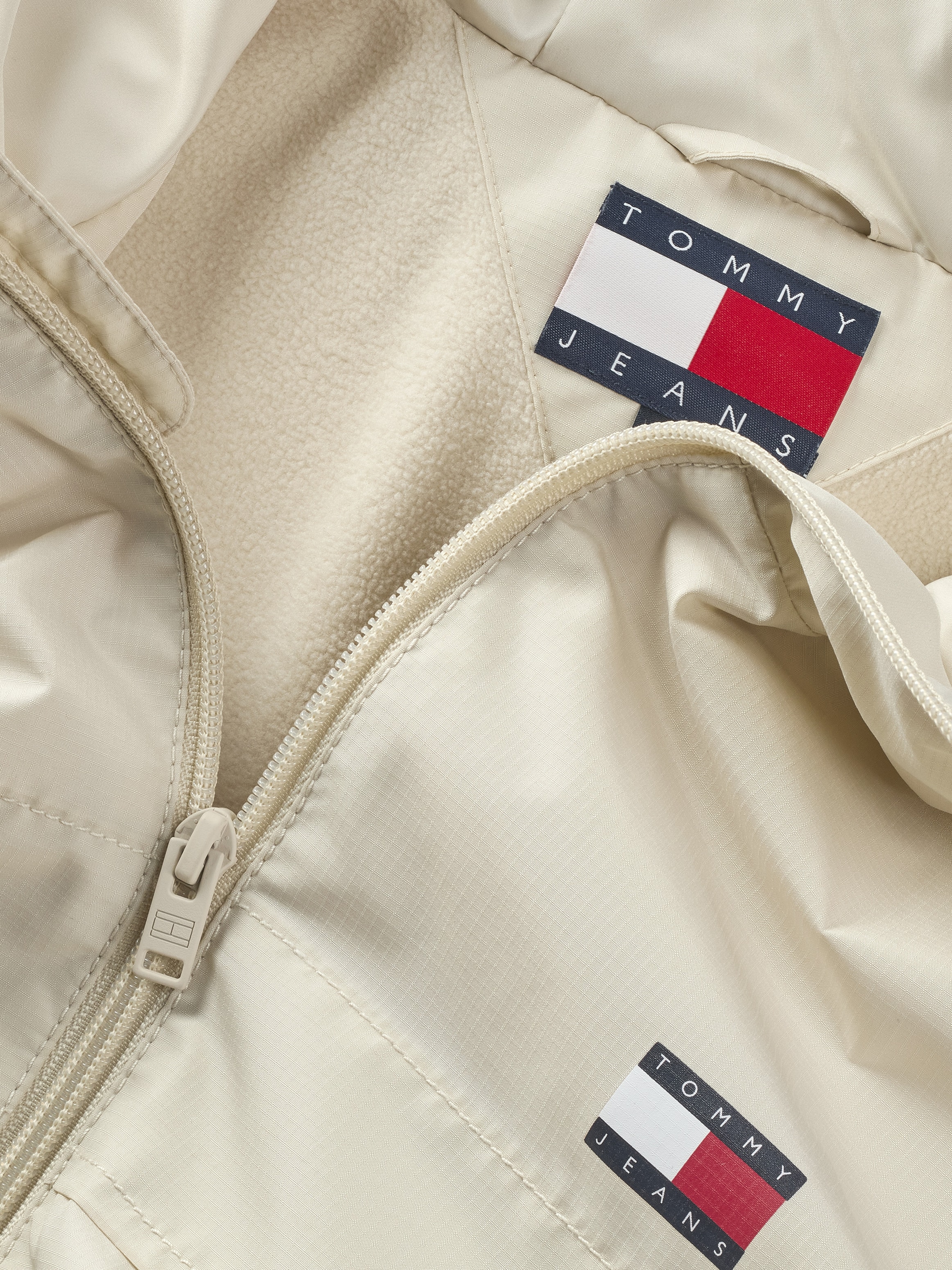 Tommy Jeans Windbreaker »TJM FLEECE LINED CHICAGO JACKET«, mit Kapuze, mit Fleece-Futter