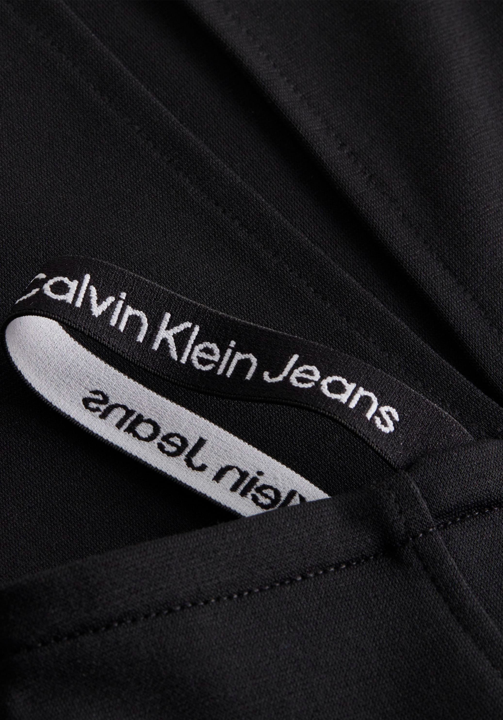 ♕ Calvin Klein Jeans Jerseyrock STRAPS »LOGO mit versandkostenfrei auf MILANO LONG Calvin Logo-Straps SLEEVE«, Klein