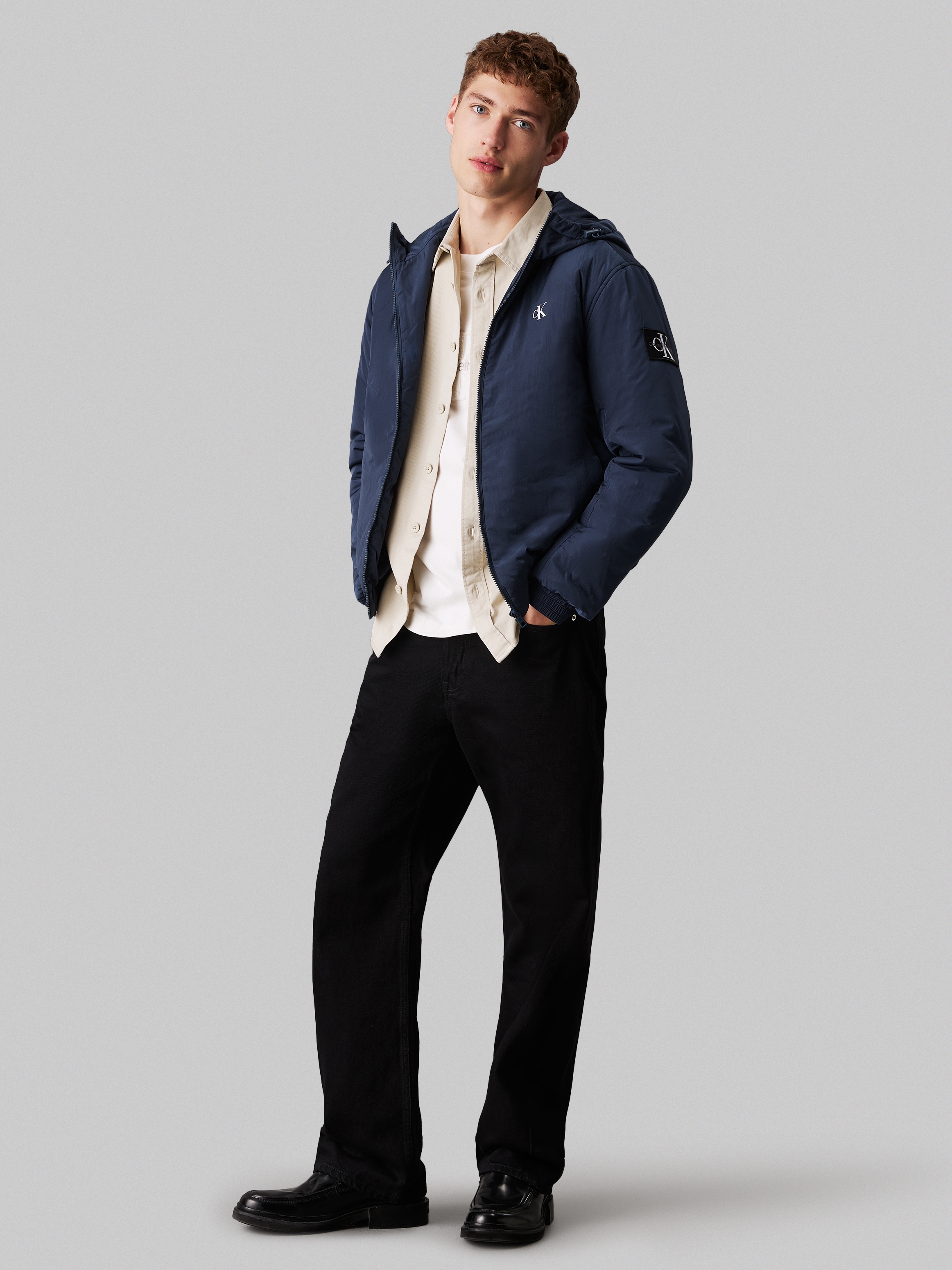 Calvin Klein Jeans Outdoorjacke »PADDED HOODED HARRINGTON« mit Kapuze mit Logoprägung