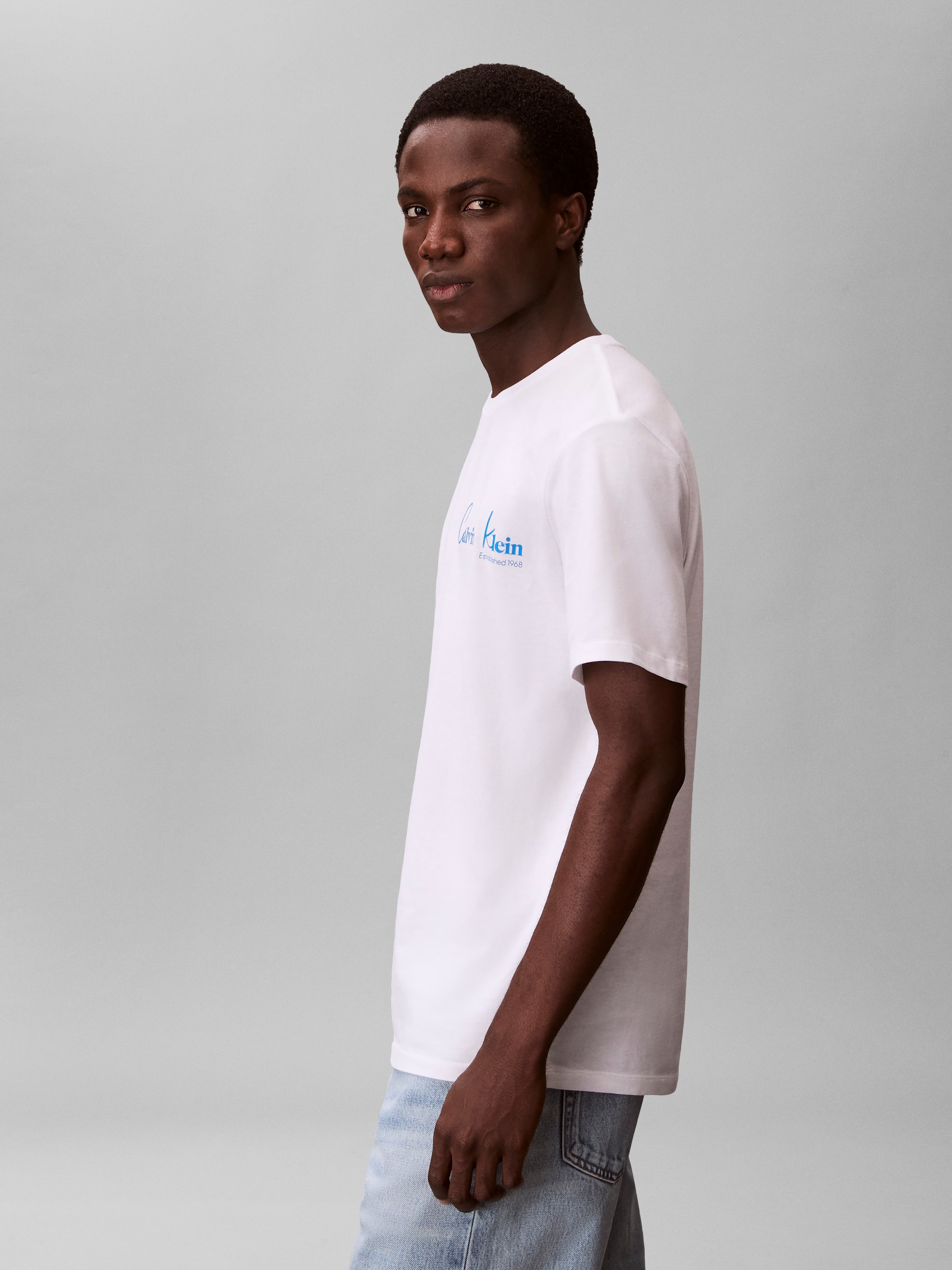 Calvin Klein Jeans T-Shirt »JEANS GRAPHICS« Regular fit mit Markenprint