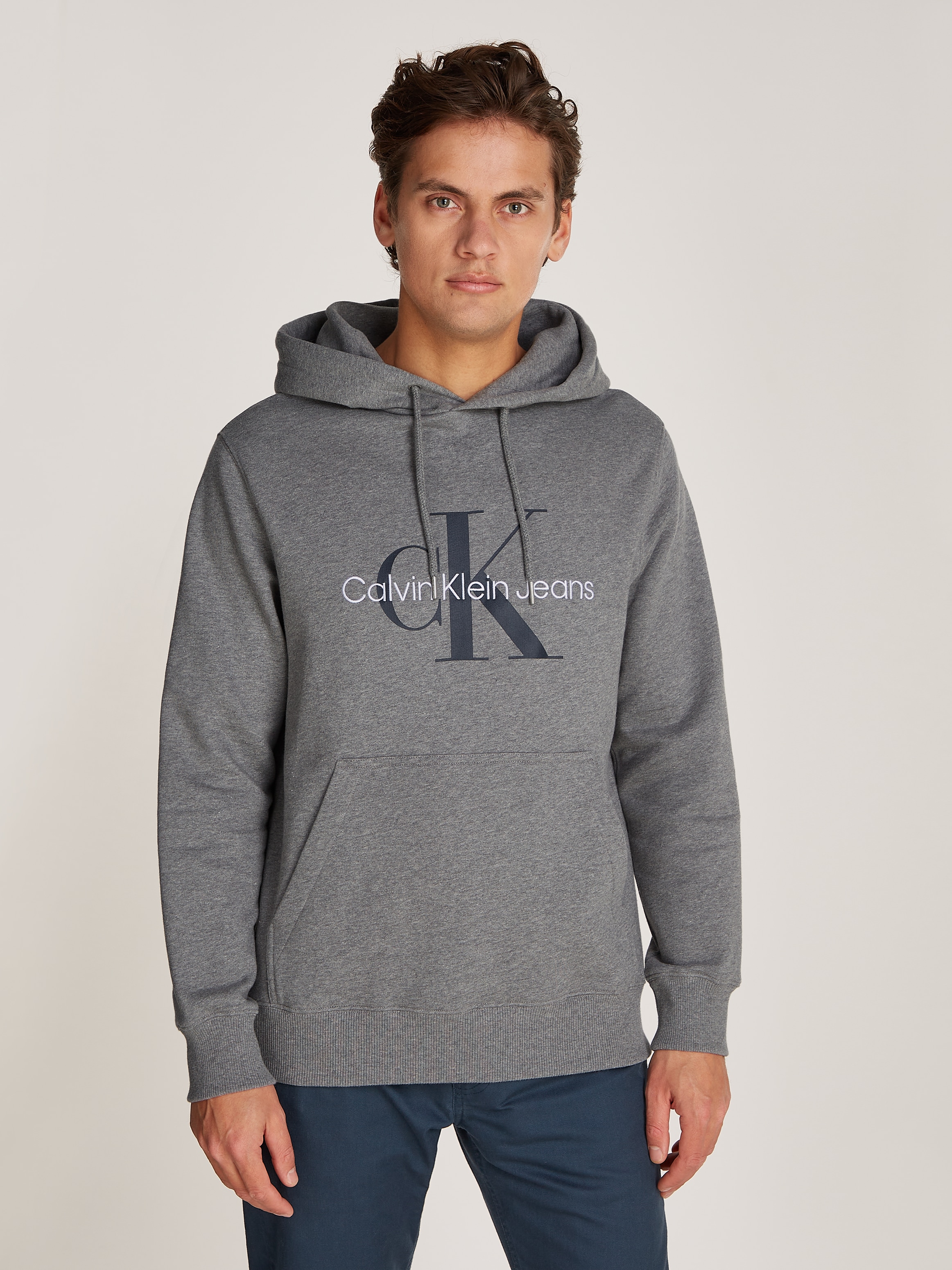 Calvin Klein Jeans Kapuzensweatshirt »SEASONAL MONOLOGO REGULAR HOODIE«, mit Logodruck und Stickerei