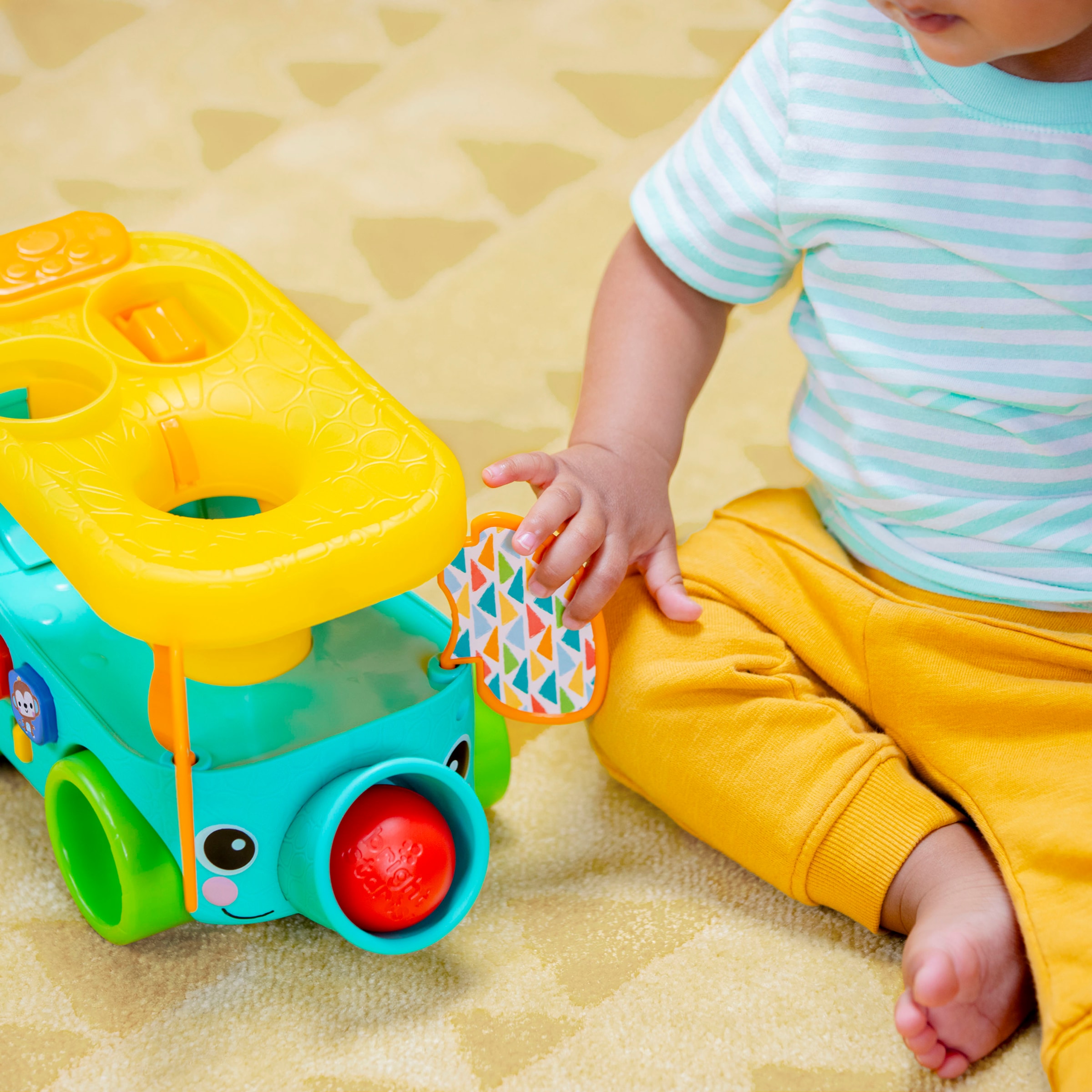 Bright Starts Jouets éducatifs »Pop & Roll Safari Bus  Ball Play Toy« mit Licht und Sound