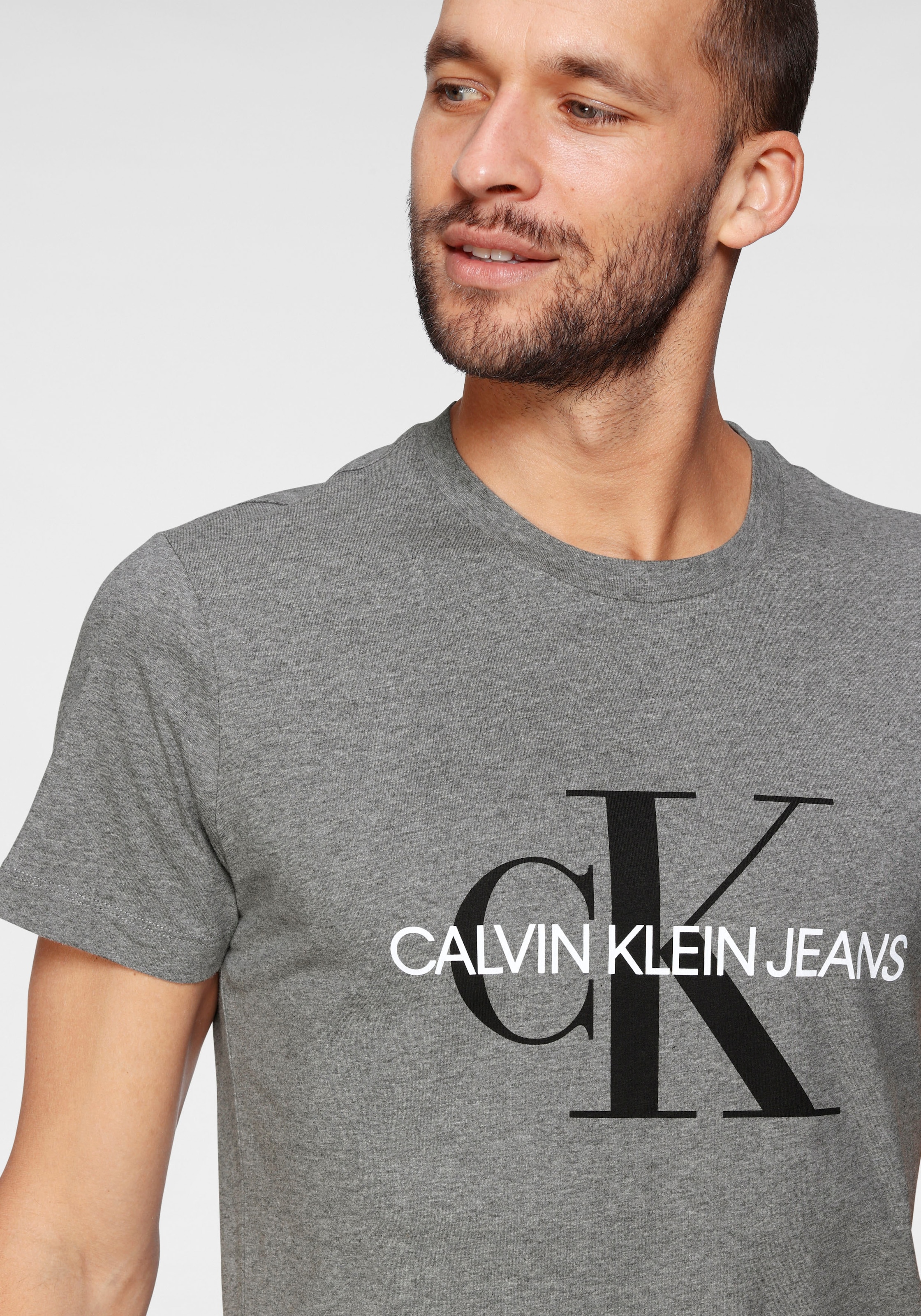 Calvin Klein Jeans T-Shirt »ICONIC MONOGRAM SLIM TEE«, mit grossem CK-Print