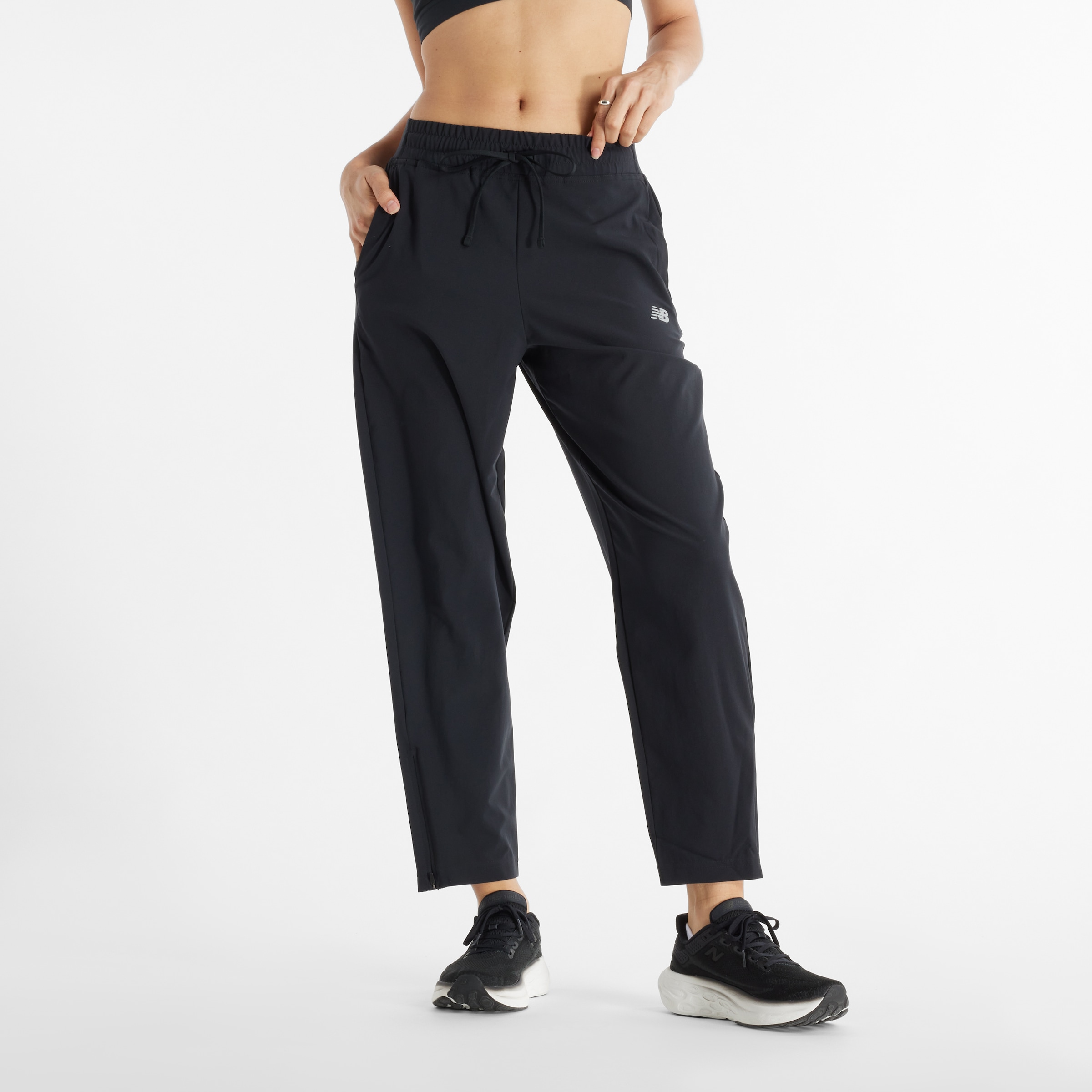 Image of New Balance Trainingshose "Sport Essentials Performance Woven Pant" für Laufen, atmungsaktive Webhose, leichtes Material, aus Polyester