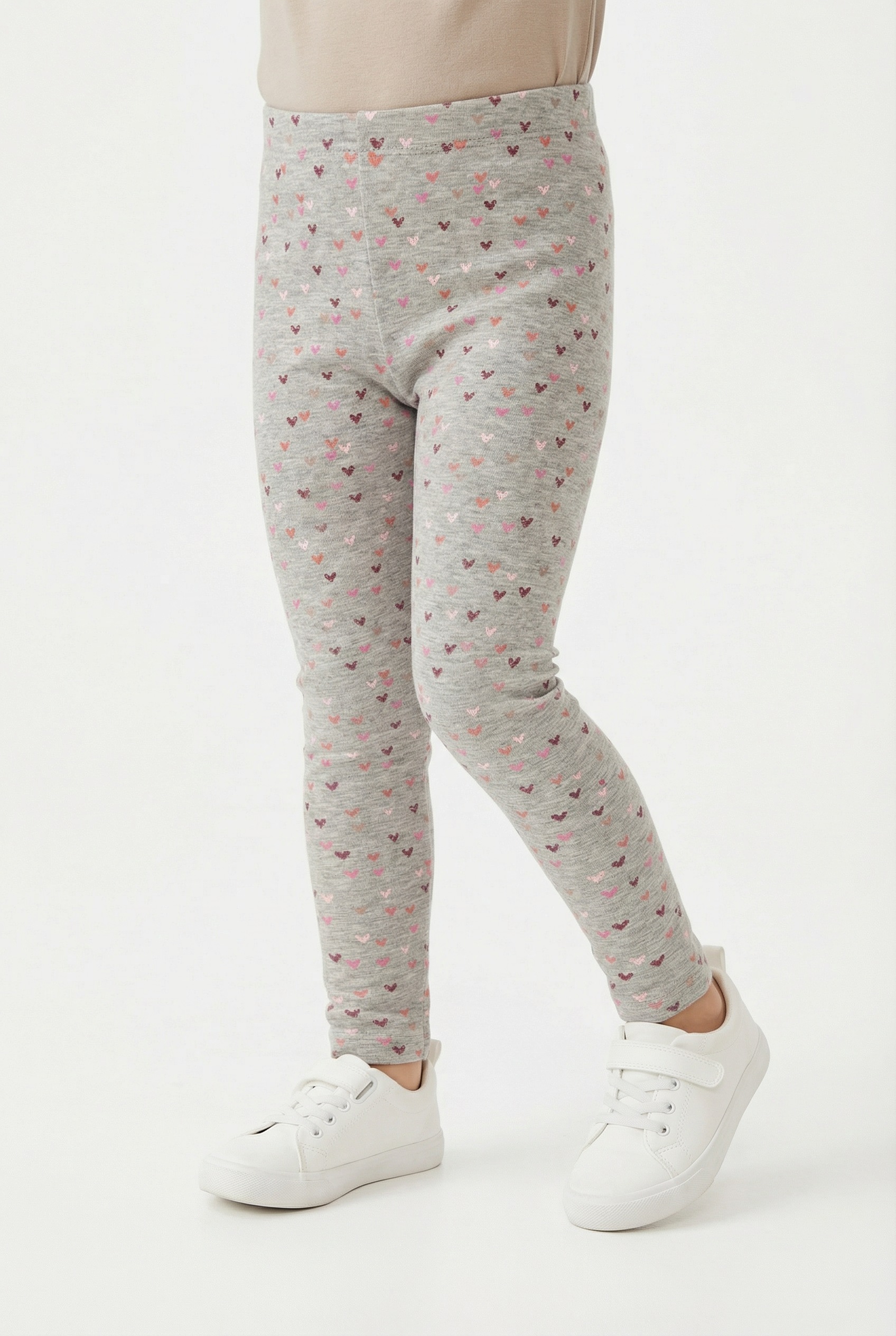 Image of happy girls Strickleggings im süssen Herzchen-Allover