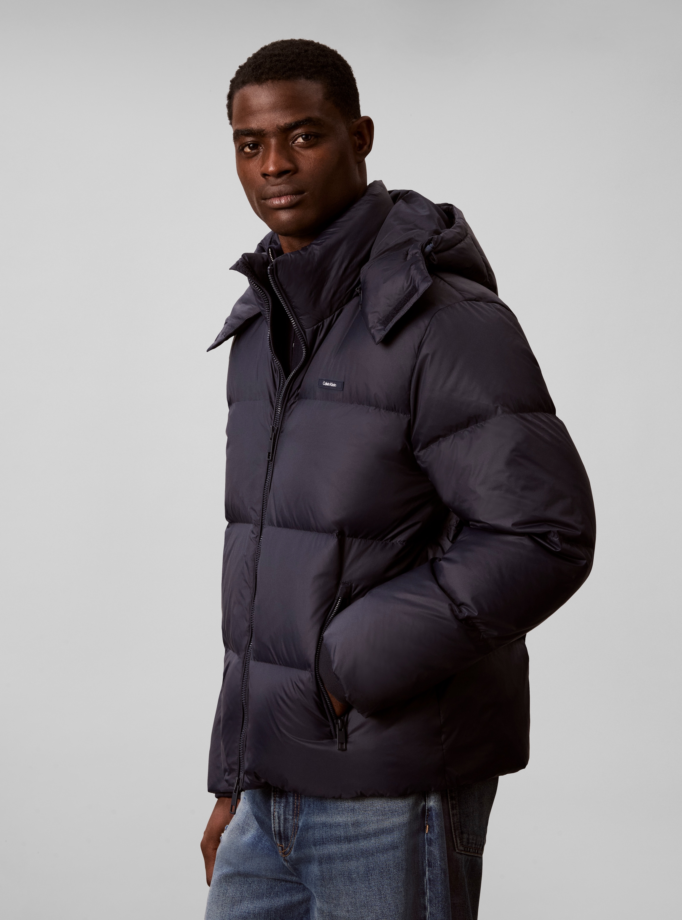 Calvin Klein Jeans Steppjacke »NYLON DETACHABLE HOOD DOWN« mit Kapuze Regular fit mit Kapuze