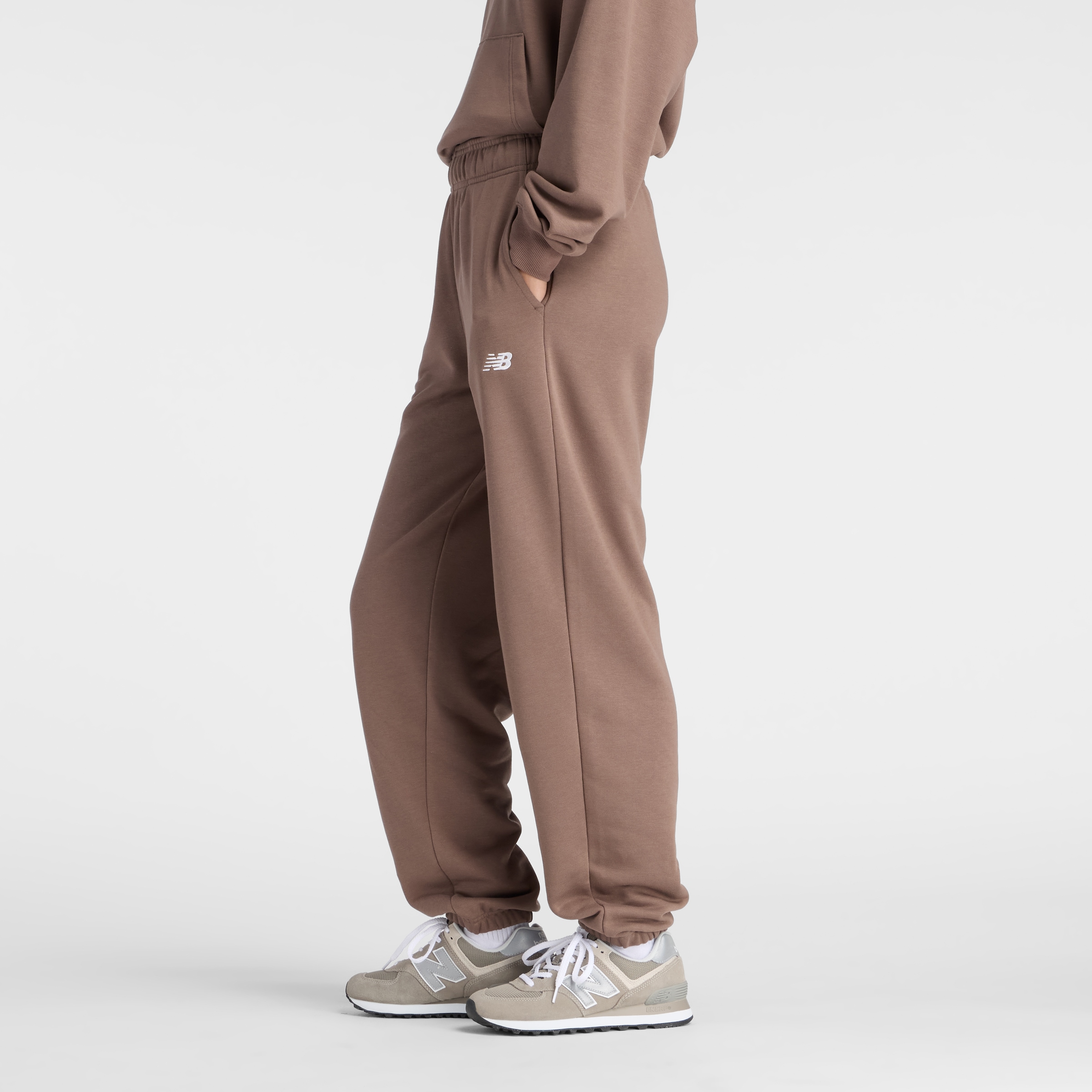 New Balance Pantalon de jogging »SPORT ESSENTIALS FRENCH TERRY JOGGER«  lockere Passform