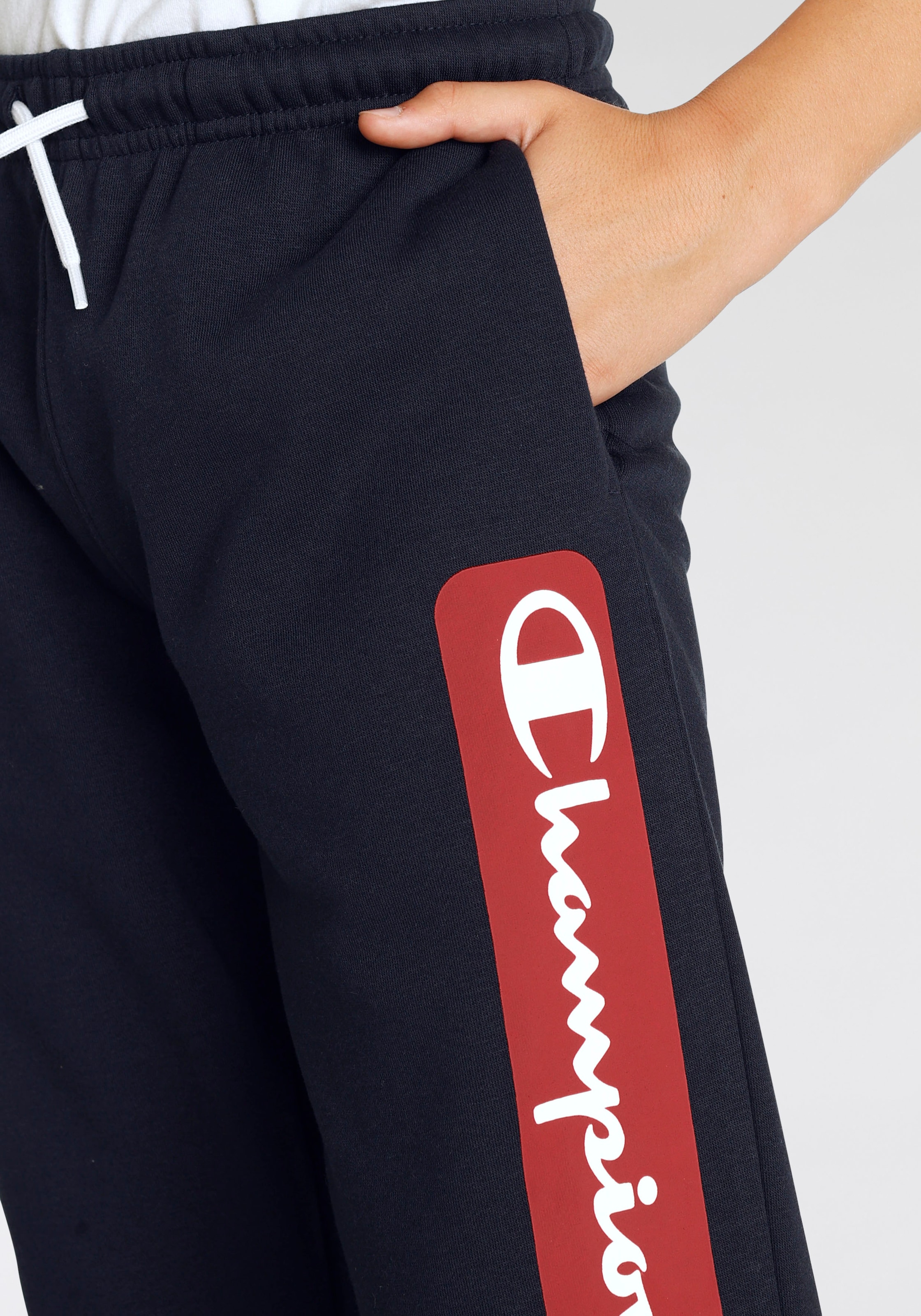 Entdecke Champion - Pants für auf »Graphic Elastic Jogginghose Kinder« Shop Cuff