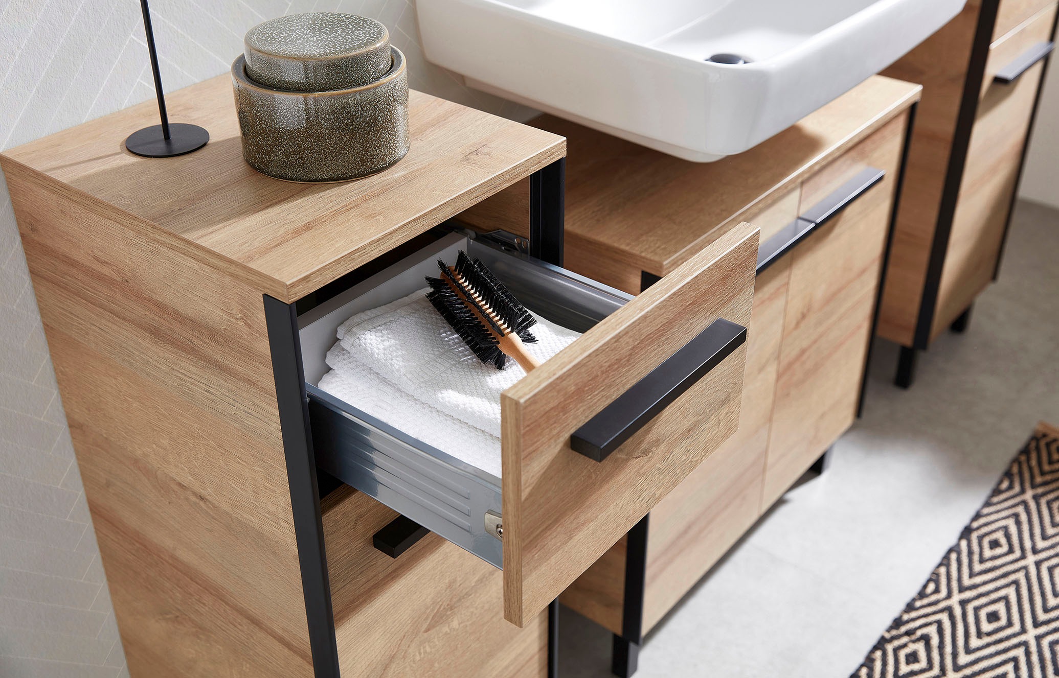 Saphir Armoire basse »Quickset 395 Badschrank, 1 Tür, 1 Schublade, 30cm breit, Griff Schwarz« meubles de salle de bain incl. amortisseurs de porte, imitation chêne Riviera horizontal