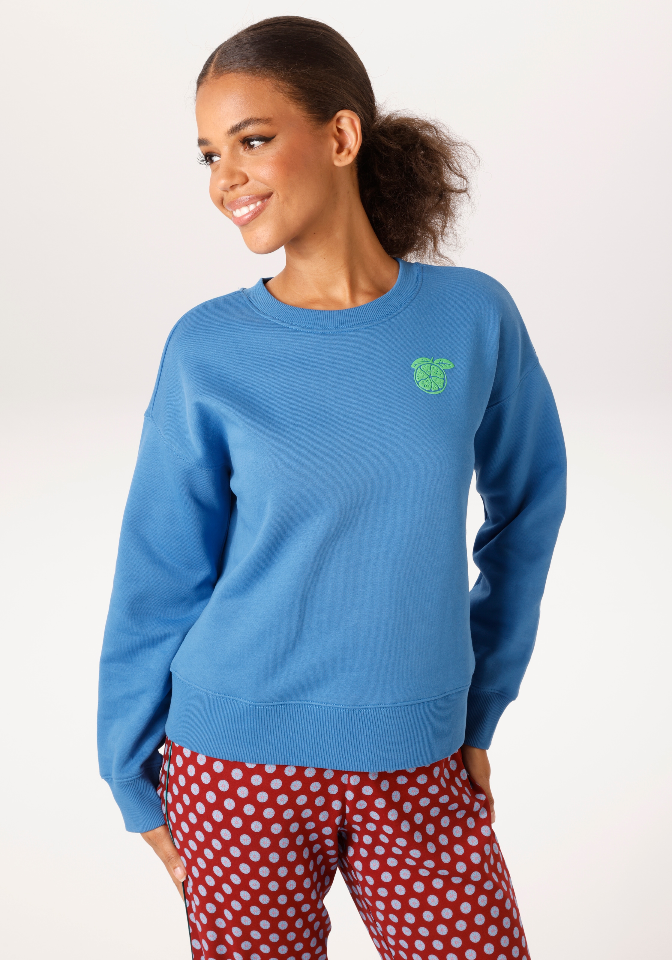 Image of Aniston CASUAL Sweatshirt, mit fruchtiger Applikation