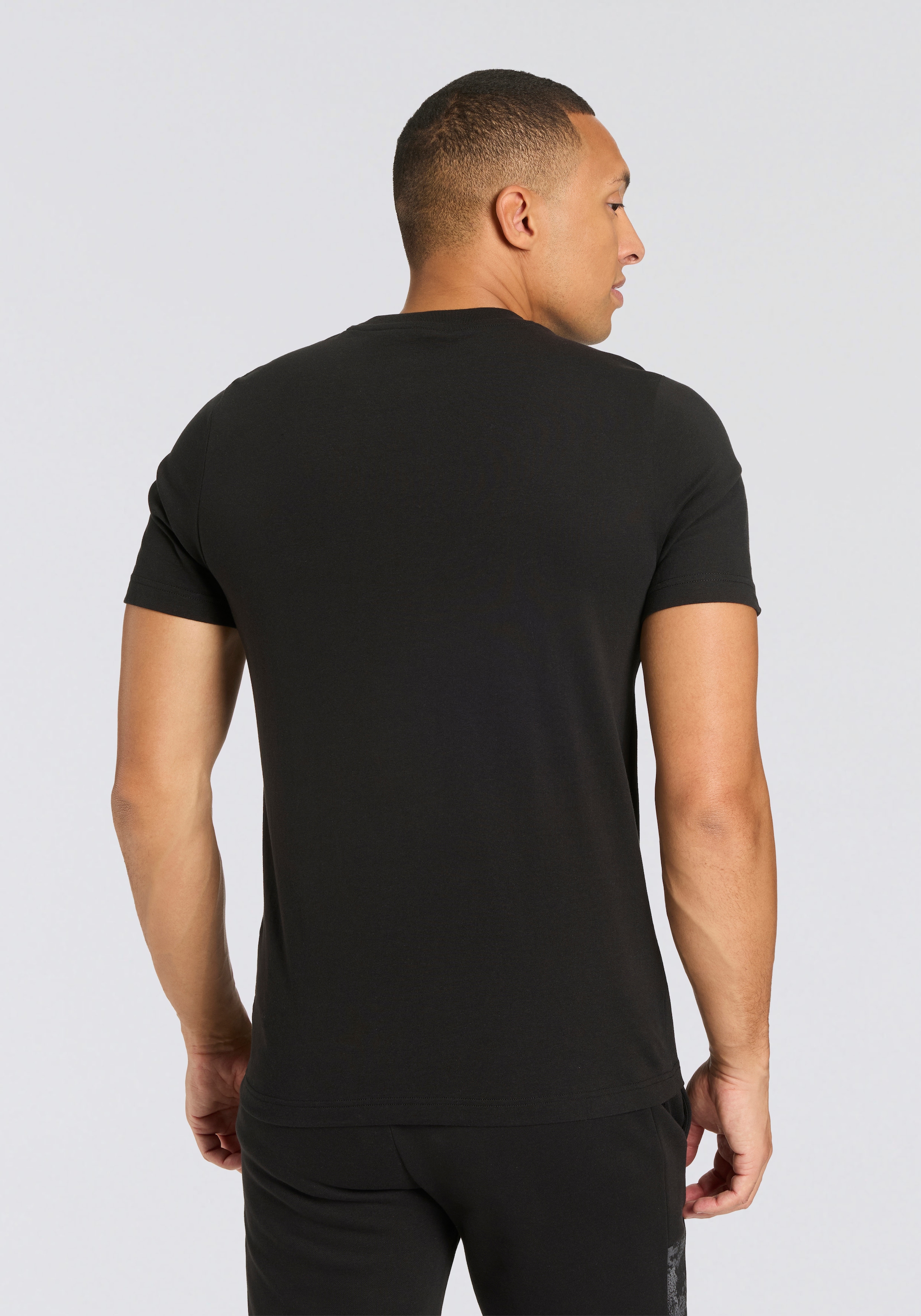 PUMA T-Shirt »ESS CAMO TEE«