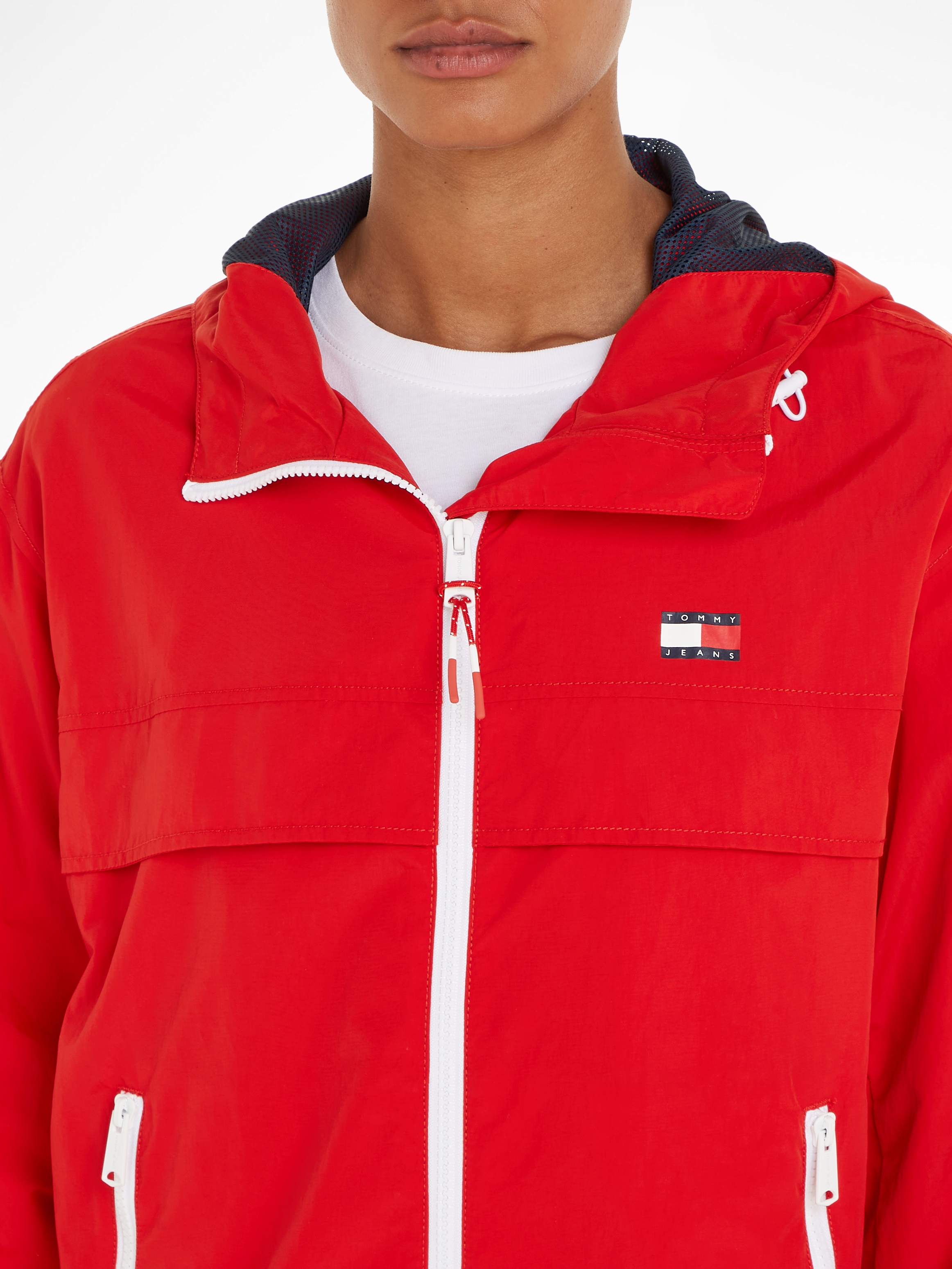 Tommy Jeans Windbreaker »TJW CHICAGO WINDBREAKER EXT«, mit Kapuze, mit kontrastfarbenen Reissverschlüssen