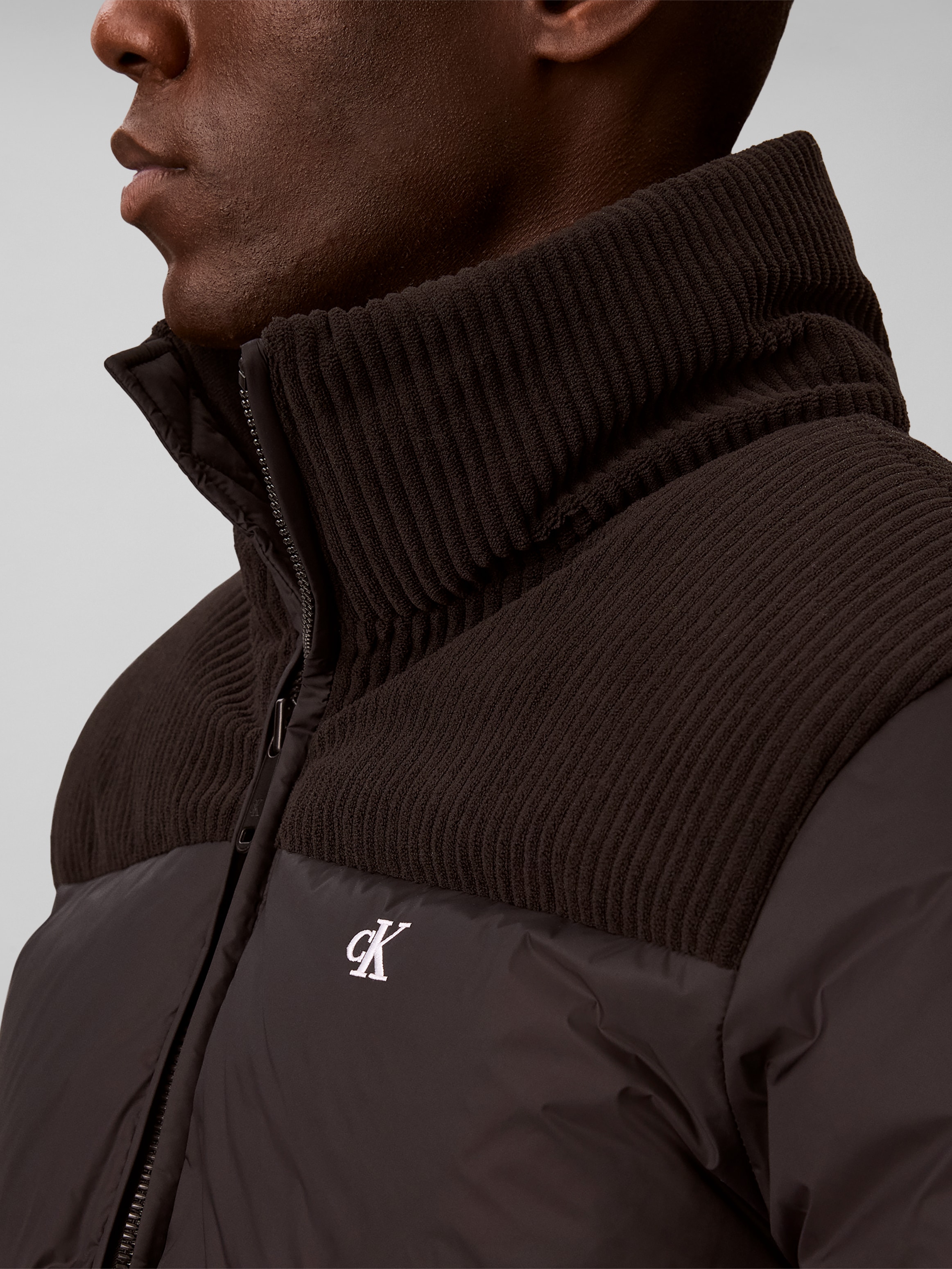 Calvin Klein Veste matelassée »MIXED MEDIA DOWN PUFFER« sans capuche coupe régulière avec col montant