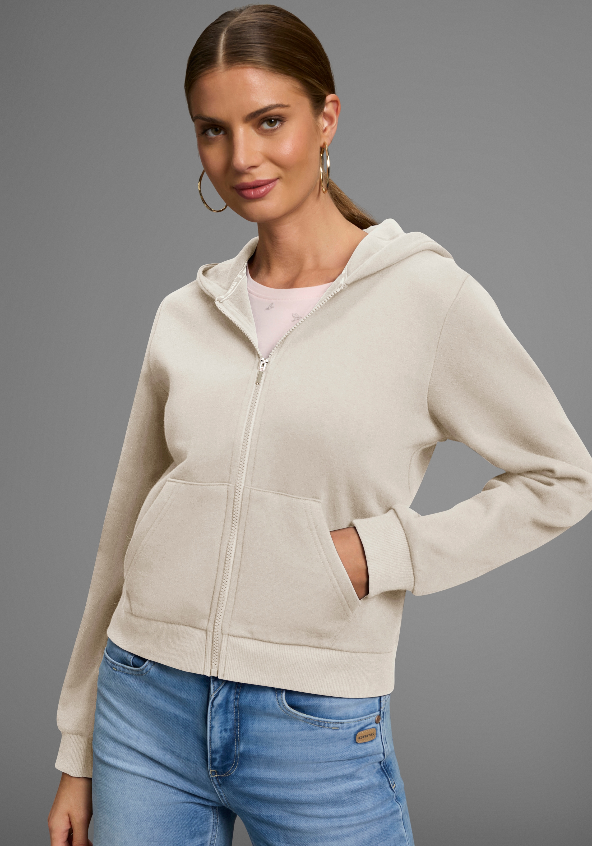 Image of DELMAO Kapuzensweatjacke mit Reissverschluss, Kapuze & Kängurutasche