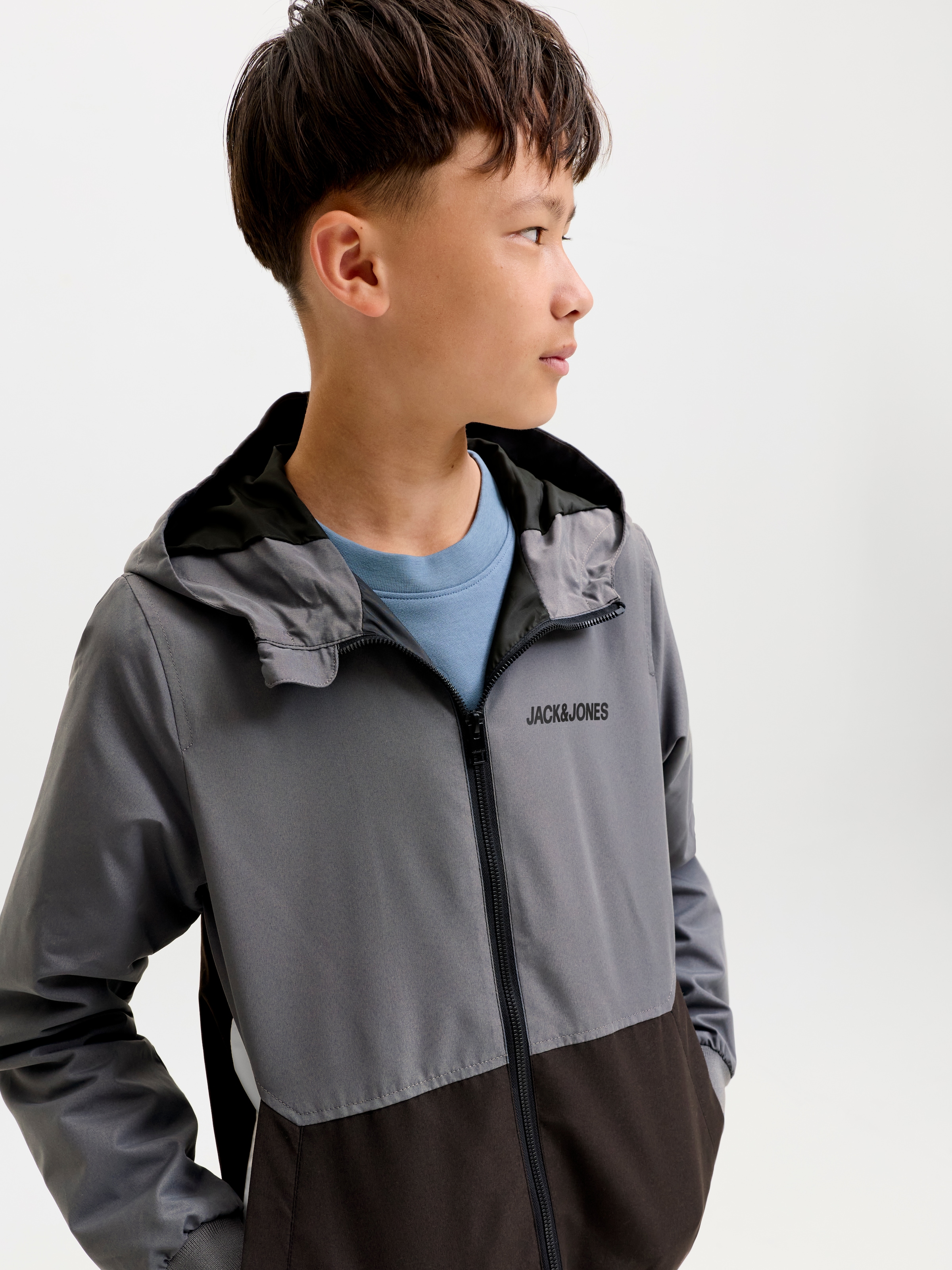 Jack & Jones Junior Veste d'extérieur »JJERUSH wasserabweisend, mit Kapuze, mattes Finish« avec capuche Polyester, coupe régulière