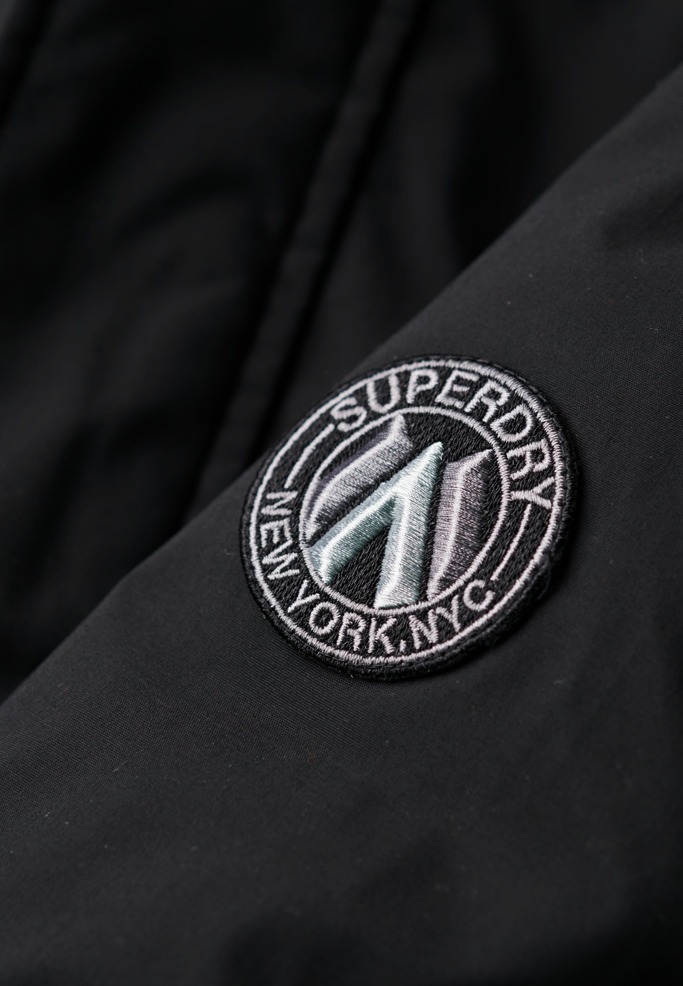 Superdry Veste bomber »CITY PADDED BOMBER JACKET« sans capuche Materialmix, regular fit