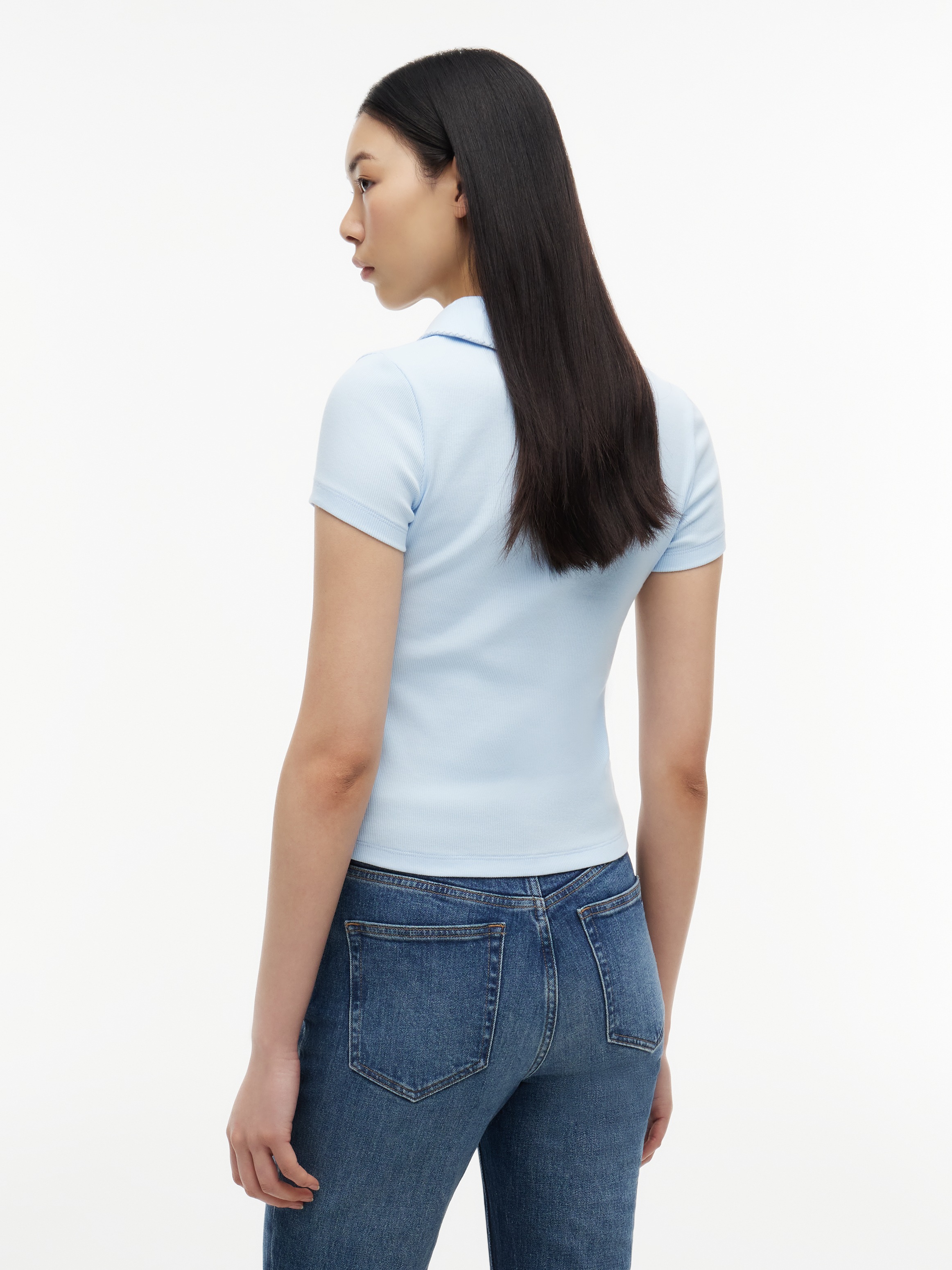 Tommy Jeans Poloshirt »TJW SLIM RIB SCRIPT POLO« Baumwollmischung, slim fit, figurbetont, in gerippter Struktur