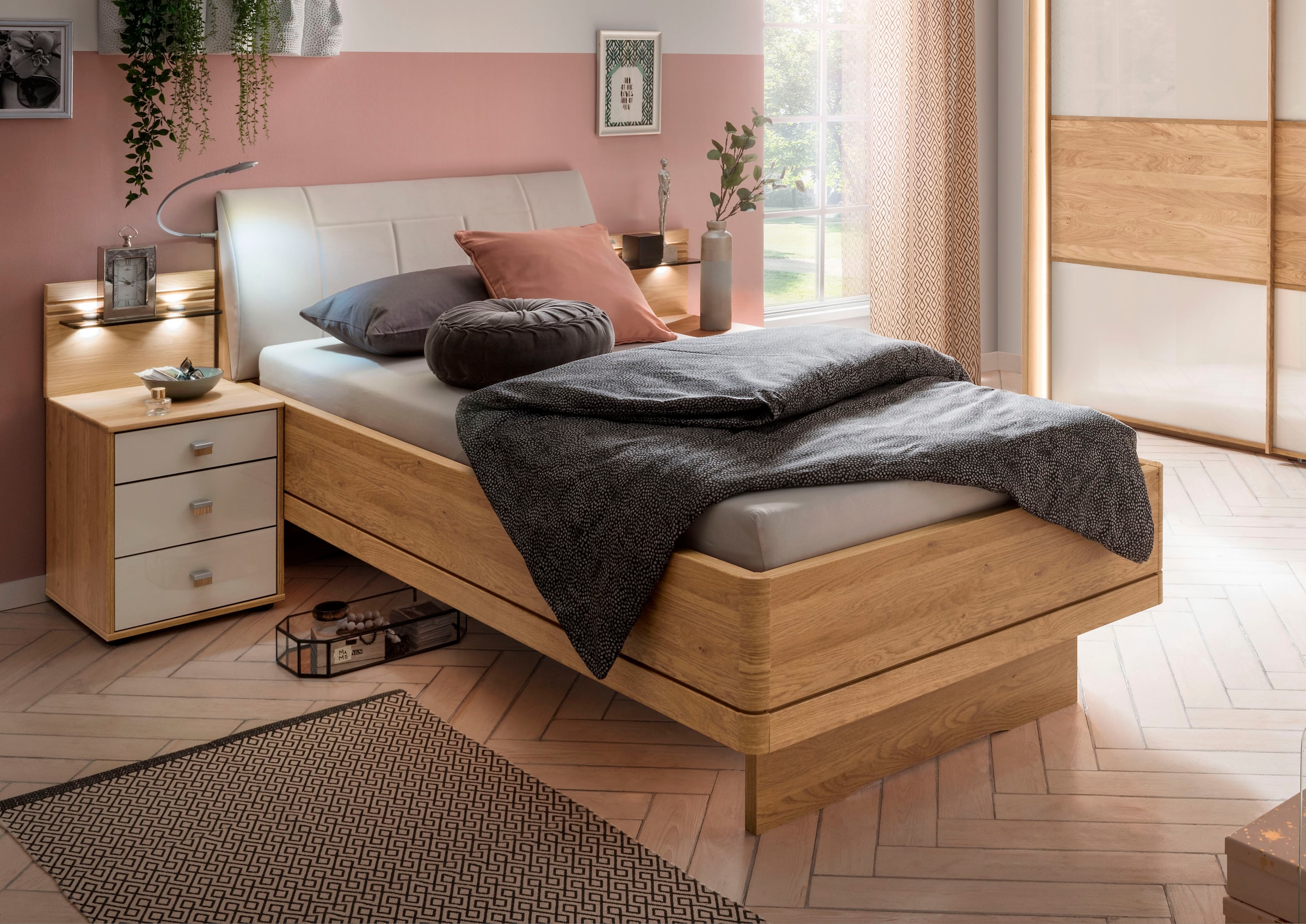Holzbett »Kiruna, Made in Germany, formschön und stilvoll«, in Komforthöhe mit...