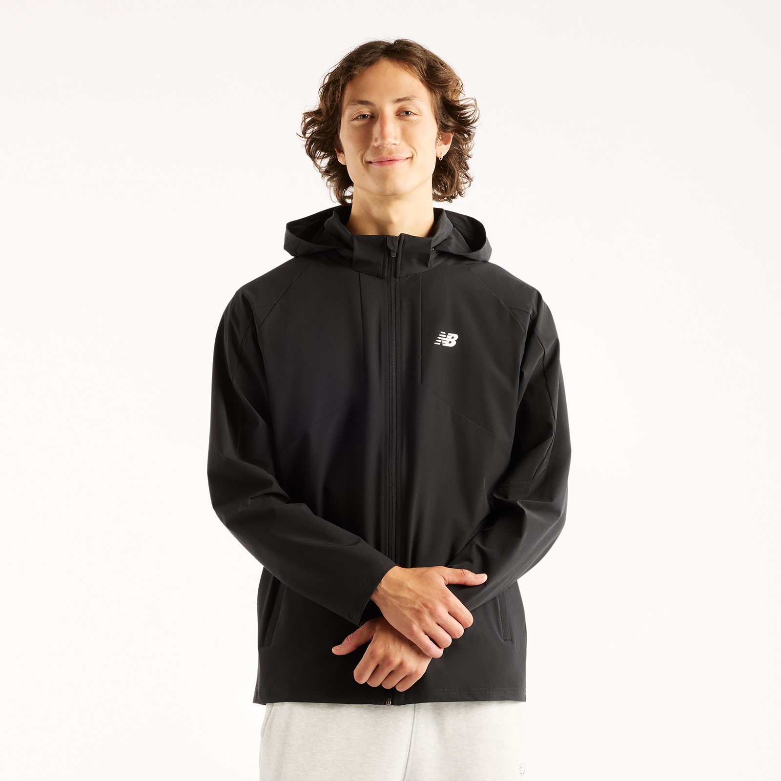 Image of New Balance Trainingsjacke "UTILITY STRETCH WOVEN JACKET" Trainingsjacke für Fitness und sportliche Aktivitäten