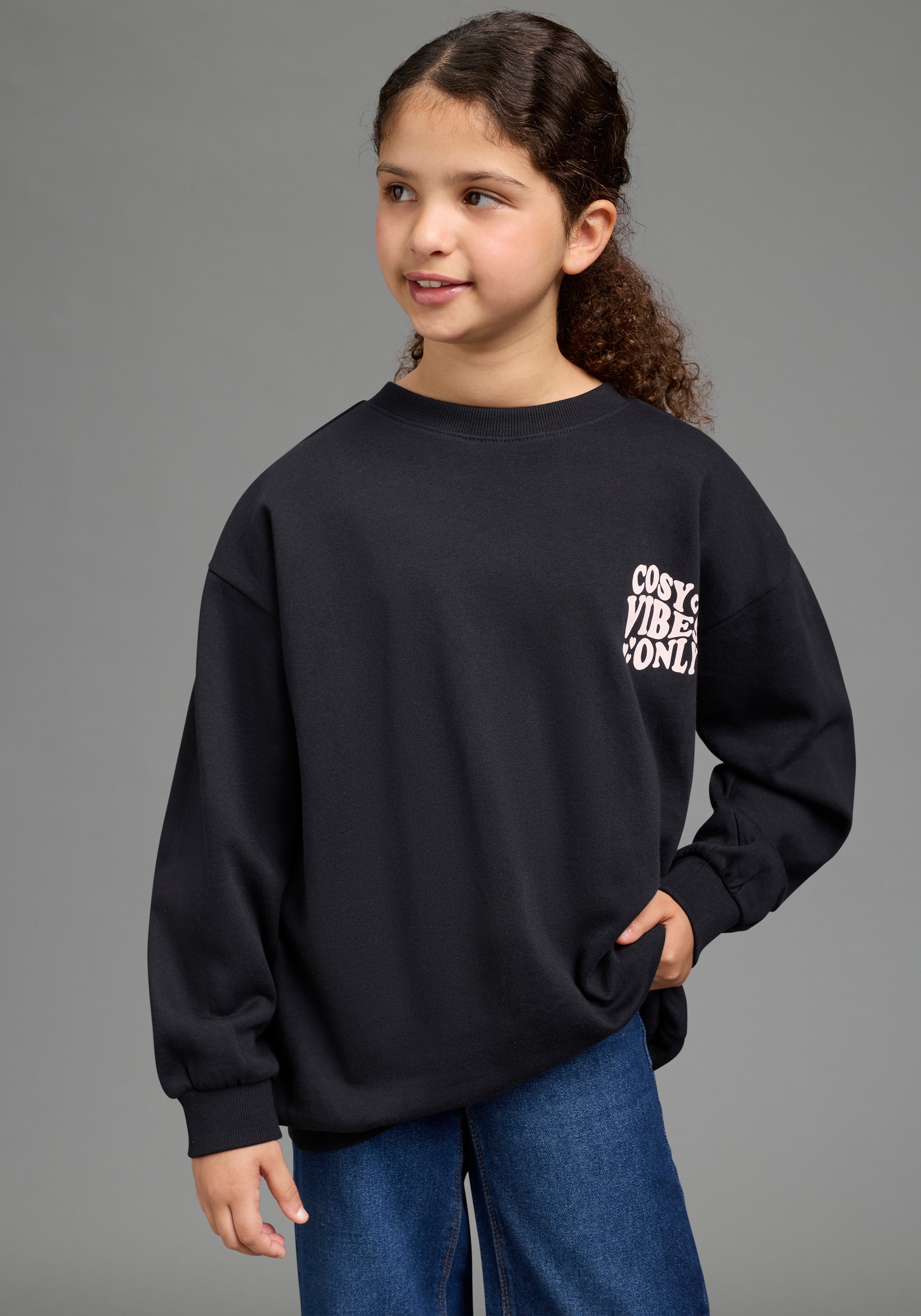 Image of KIDSWORLD Sweatshirt "Rückenprint Sweatshirt in lockerer Form", Weites Sweatshirt mir Front- und Rückendruck in bequemer Form