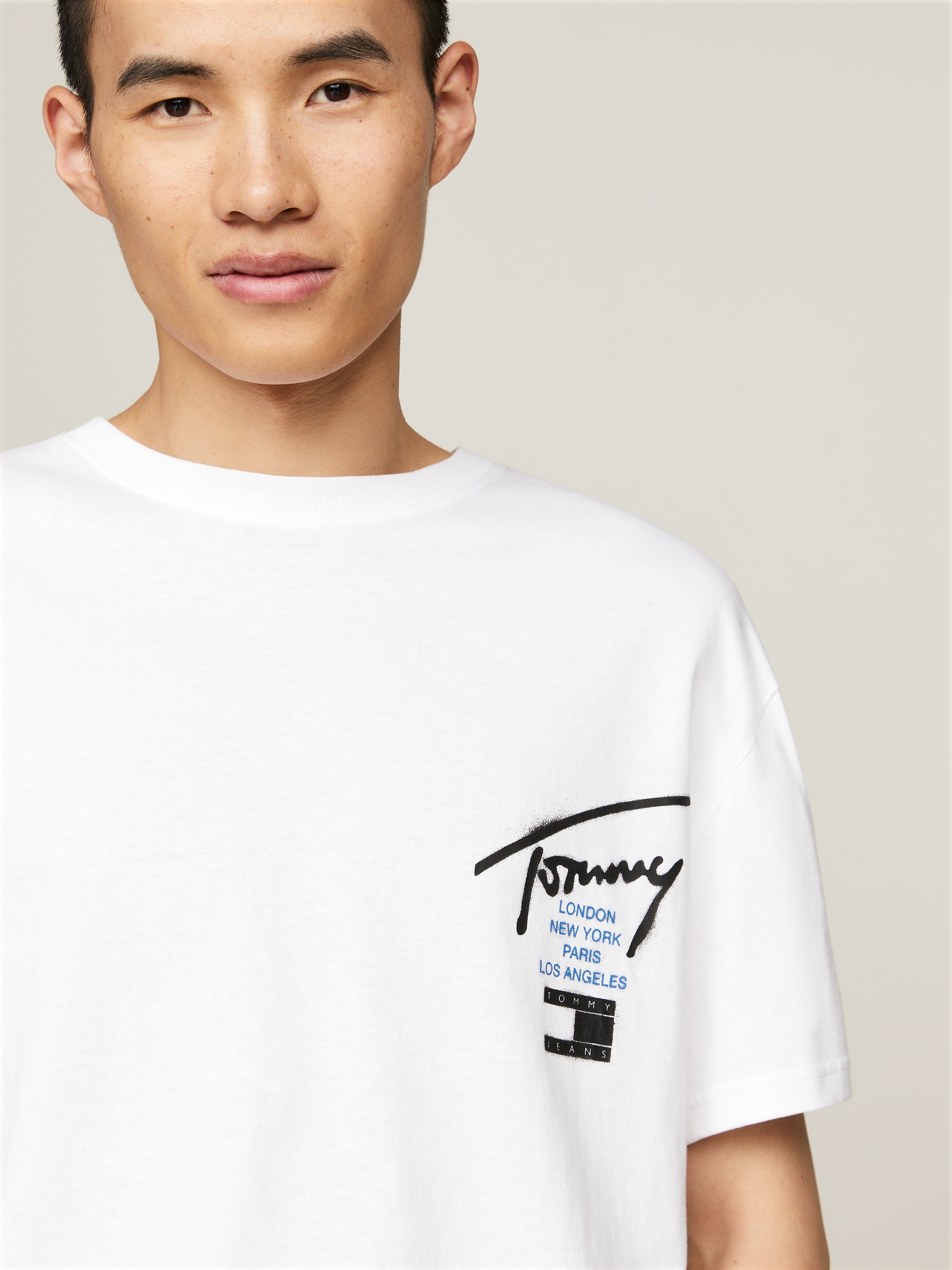 Tommy Jeans T-Shirt »TJM REG GRAFFITI SIG TEE EXT«, mit Logoschriftzug