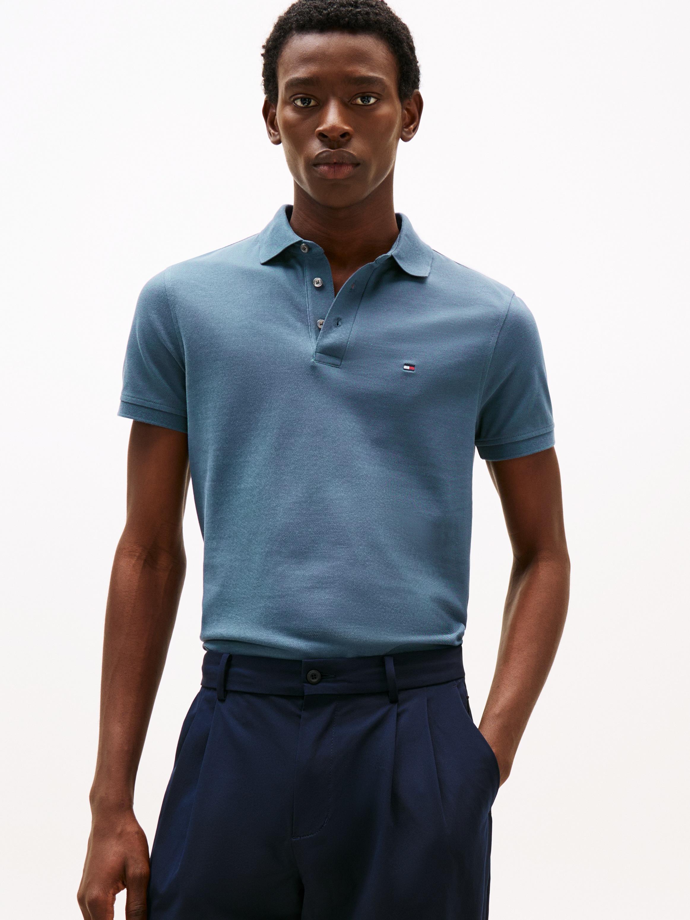 Tommy Hilfiger Poloshirt »1985 SLIM POLO mit Piqué-Struktur und Stickerei«, meliert, casual, slim fit, Baumwollmix, Polokragen