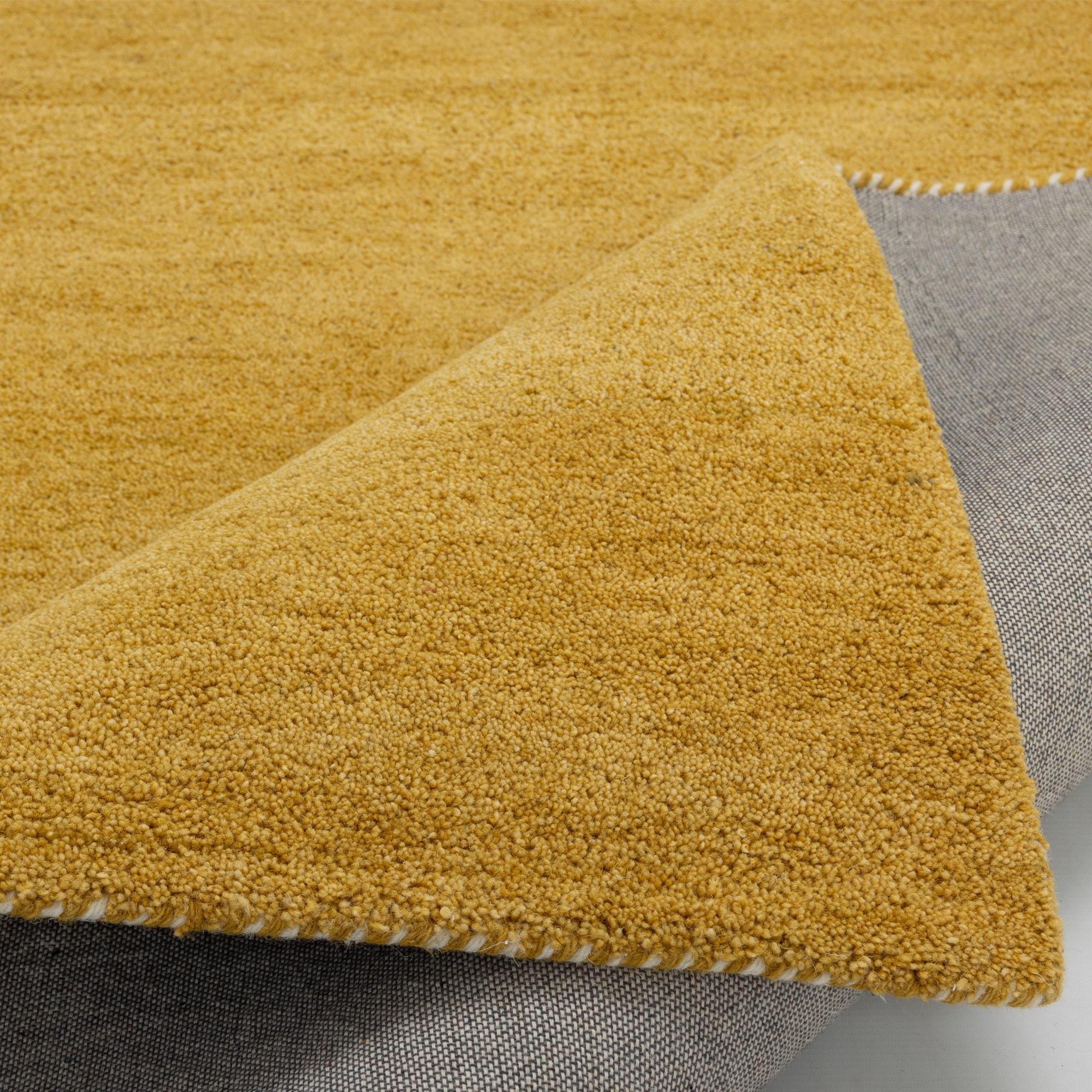 THEKO Wollteppich »Gabbeh Uni, Handgefertigt, meliert, auch als Läufer erhältlich, Wolle« rechteckig 14 mm Höhe Schlafzimmer, Wohnzimmer, Esszimmer, auch als Läufer oder rund